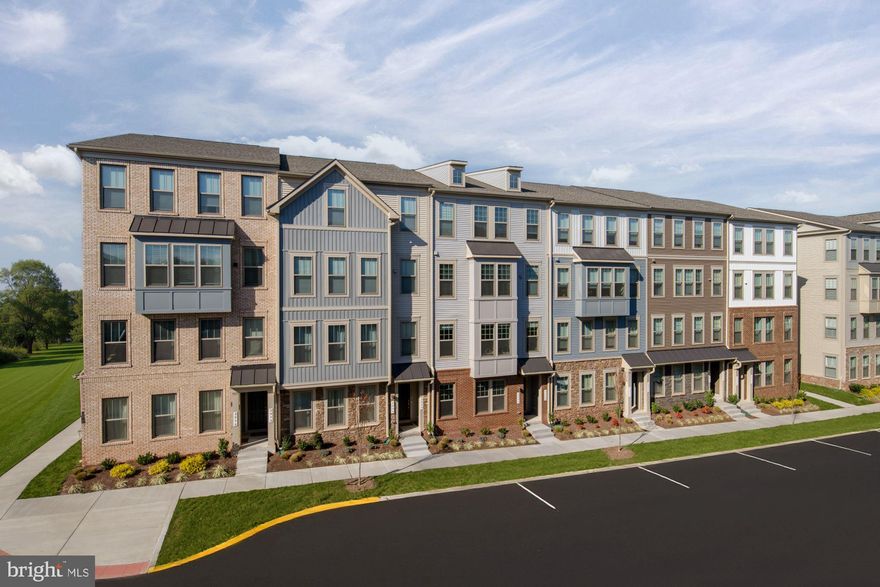 SPRING DELIVERY! Brand New Stanley Martin 2 Level Garage Condo Village at Manassas Park is conveniently located amongst upcoming shopping, dining, entertainment, and outdoor recreation fun. January/February delivery!  Commuting convenience and low maintenance living is what we’re all about! Just a 2-minute walk to the Virginia Railway Express Station that will take you right into Washington D.C. Spend less time with commuting and maintenance and more time making memories with loved ones at home. Manassas Park City Hall at Park Central offers brand new 2-level public library with a brand new Sprinkler Park!  Step inside The Tessa, and immediately fall in love with the elevated finishes and contemporary layout. This low-maintenance home has everything you need including a 1-car, rear-load garage with a full driveway which makes getting in and out of your vehicle during inclement weather quick and easy. Step inside your inviting, light-filled family room that opens into the breakfast area and kitchen featuring quartz countertops and an abundance of cabinets to hold all your hosting necessities. The upper level is where you’ll find your spacious owner's suite to unwind with not one but TWO walk-in closets with plenty of room to store all your belongings. Attached outdoor balcony is for you to create your own work from home sanctuary, yoga, or art studio! The two additional bedrooms and private bath next door is perfect for family or friends to stay. Come discover why the Tessa is the perfect design to complement your lifestyle. Move in this January! *Photos are of similar model home*
