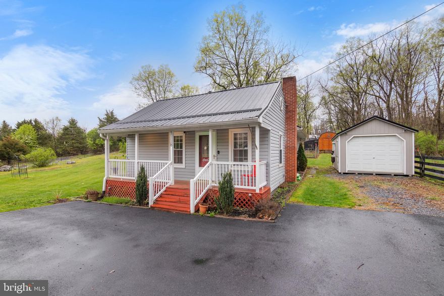 Welcome to 1118 Nipetown Road! This delightful home is nestled on just over an acre of unrestricted land, perfectly situated just minutes from Interstate 81 for easy commuting. As you arrive, a freshly paved driveway welcomes you with ample parking space. The expansive open yard offers endless potential for outdoor enjoyment and activities. Next to the home, you’ll find a large detached garage that’s been recently upgraded with new flooring, electrical work, and air conditioning. Making it an ideal space for a workshop, office space, or additional storage. Toward the rear of the property sits a spacious shed, perfect for keeping tools and equipment. You’ll also discover a generous fenced-in area featuring a sizable chicken coop and plenty of space for animals to roam, making it a great setup for small scale farming. The charming front porch invites you to relax and enjoy the outdoors. Inside, the bright and airy living room has been updated with fresh paint and durable LVP flooring, while large windows flood the space with natural light. Just off the living room is the first of two cozy bedrooms. The updated kitchen and dining area feature sleek new stainless steel appliances, refreshed cabinetry with modern hardware, and a striking brick accent wall. New flooring and fresh paint enhance the modern but classic feel. The bathroom has also been thoughtfully updated with a large vanity, stylish flooring, and a shower/tub combo. The spacious primary bedroom offers large windows, updated flooring, and a versatile bonus space, ideal for a walk-in closet or home office. At the back of the home, you'll find a dedicated laundry area equipped with a brand-new washer and dryer, along with easy access to a recently upgraded water heater and water treatment system. This move-in-ready home blends modern updates with classic charm and provides plenty of space, comfort, and functionality. Don’t miss your chance to call it yours!