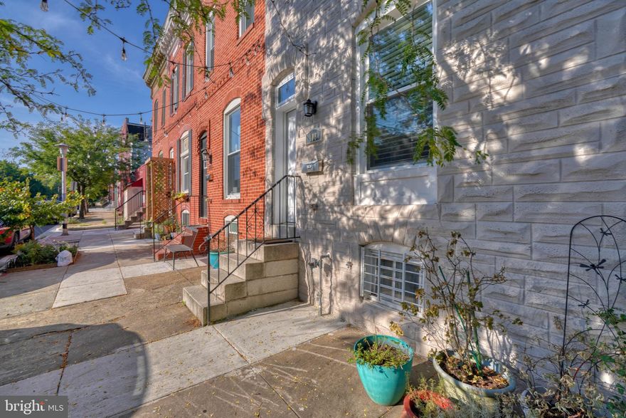 Step into this turnkey home in our lovely Charm City! This home has been reconditioned with new AC, new gas furnace (with UV Air Purifying System), new electrical ground wire, new main gas valve, new main water shut off, new windows (except front basement), new double door entry in the rear, LVP flooring, bathroom updates, fresh paint, new kitchen with stainless steel chef- grade smart home appliances, quartz counters, new HE washer and dryer stackables. Two large bedrooms on the upper floor with a large full bath, and a well designed powder room on the main level. Basement is fully sealed and full height, ready to be finished or simply used for storage. Rear fenced in parking pad. Furnace and AC have UV light air purifying system, all systems and surveillance connected through smart home technology which convey in the sale. Your investment is well appointed with systems chosen and installed to LAST!