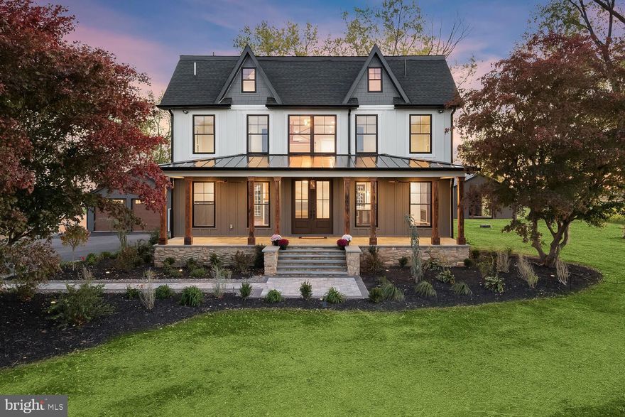 Introducing your dream home at 15775 Frederick Road, a stunning modern farmhouse perfectly designed for families seeking an idyllic rural retreat in highly sought-after Western Howard County. Set on a breathtaking 3.16-acre plot, this magnificent 5-bedroom, 4.5-bathroom, single-family residence offers an abundance of space. Sparing no expense from top to bottom complemented with quality finishes, detail, sophistication, and charm. From the moment you enter the tree-lined driveway, you'll be captivated by the beautifully landscaped grounds and inviting covered front porch with decorative wood beams and blue stone. Surround yourself with awe-inspiring panoramic views of the picturesque countryside, complete with a charming neighboring sunflower farm. The expansive deck overlooks multiple outbuildings. For the avid car enthusiast or farmer, the outbuildings have a plethora of possibilities.  Step inside and be greeted by gorgeous hand-scraped hardwood floors, exquisite lighting, and delightful details throughout. Oversized windows bathe the entire home in an abundance of natural light, creating an inviting atmosphere for your family to enjoy. The beautiful living room boasts a decorative gas-burning fireplace, perfect for curling up on cool evenings. For the culinary enthusiast, the chef's kitchen is a dream come true, featuring top-of-the-line ZLINE appliances, a 48” range six burner stove, a pot filler, and an oversized waterfall quartzite island with seating. Soft-close cabinetry with lighting and pullouts, a wine refrigerator, and a farmhouse-style sink add even more appeal. Entertain with ease in the adjoining dining area and family room, or work from home in the convenient home office. Upstairs, you'll find the luxurious primary suite, complete with a cathedral ceiling, ceiling fan, sitting room, and a custom walk-in closet, as well as three additional spacious bedrooms, a full bath, an ensuite bath, and a laundry room. The top level offers a fantastic loft, a fifth bedroom, and a full bath. Indulge in endless recreation possibilities in the finished lower level, complete with luxury vinyl plank flooring and walkout access to the tranquil outdoors. With over 20 parking spaces and multiple outbuildings, this one-of-a-kind masterpiece truly has it all. Don't miss your chance to call it your own!