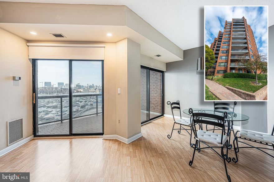 CHARMING MOVE-IN READY CONDO IN ONE OF CANTON'S PREMIERE WATERFRONT BUILDINGS!  Features include wood laminate flooring throughout, a spacious living room with dining area, Chef's kitchen with ss appliances, and ample cabinet space, large Primary bedroom with a full bath with a tub/shower and separate shower, in-unit laundry, dual entry balcony with sweeping water and city views, and secure garage parking!  Unit is located in a secure building with amenities including an exercise room, meeting room, and 24 hr. security.  Location can't be beat - walking distance to tons of restaurants and shopping, and located right on the Promenade.  This is city living at its best!