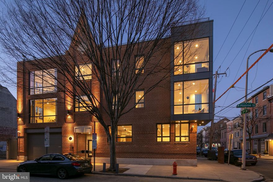 Behold this unique & sunlit corner home in the heart of Queen Village (and Meredith School District) featuring 6 bedrooms, 5 full baths, 2 half baths, a den, 2-car garage, incredible 2-tier rooftop terrace, wood flooring, 3-zoned HVAC, full storage basement (could easily be finished) and MORE! The first floor offers a corner living and dining room with incredible light and space paired with a fully complete chef s kitchen. The kitchen boasts stainless steel appliances including 2 Vulcan ovens with 10 burner stovetop, 2 Bosch dishwashers, 2 sinks, Subzero fridge/freezer, an overabundance of cabinetry, a granite island and a bar counter overlooking the huge dining/living room area. Exposed ductwork, wood flooring and a wall of windows complete the space. The second floor offers a dramatic, sunlit living space with wood flooring, floor to ceiling windows, more windows, exposed ductwork, built-ins and a wood burning stove to cozy up on a chilly night! There are also THREE bedroom suites, all complete with wood flooring, double closets and windows galore. The third floor offers an incredible, open and spacious master bedroom suite, highlighted by a fully equipped walk-in closet, floor to ceiling windows, additional windows and a marble tile bath with 2 pedestal sinks, a soaking tub, stall shower and watershed with bidet. This level also features a laundry room, another bedroom suite, and a single bedroom. You will love the sun-filled penthouse that leads to a 2-tiered rooftop terrace with simply stunning views from sunrise to sunset. This is the ultimate spot for entertaining guests, or relaxing after a long day. Built in 2001 but appliances & mechanicals have been since updated. Nestled in one of Philly s favorite neighborhoods, Queen Village, walkable to an abundance of parks, shops, cafes, restaurants and local hotspots including Penns Landing & HeadHouse Square. This home is unbelievable  make it yours today!