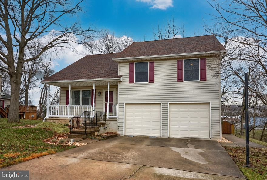 Pride of ownership shows throughout this beautiful home. Unique layout with partial cathedral ceiling over living room with the kitchen overlooking it. This home offers an eat-in kitchen with island, imported Italian subway tile backsplash, coffee bar, ceramic tile flooring, pantry, and cabinet lighting. The kitchen looks down over to a lovely, spacious, carpeted living area.  The upper level of this home is topped off with a full bath and 3 bedrooms. The lower level has an unfinished laundry area with another stove and cupboards/countertop, perfect for the canning enthusiast. The lower level also offers a nice, finished family room area that walks out to a deck.  Enjoy energy efficient gas heat, gas hot water heater and gas cooking. Newer roof put on 12/16! This home is close to 83 and mere minutes away from shopping, grocery stores, restaurants and entertainment for utmost convenience. Don't wait or you'll miss out on one great home!