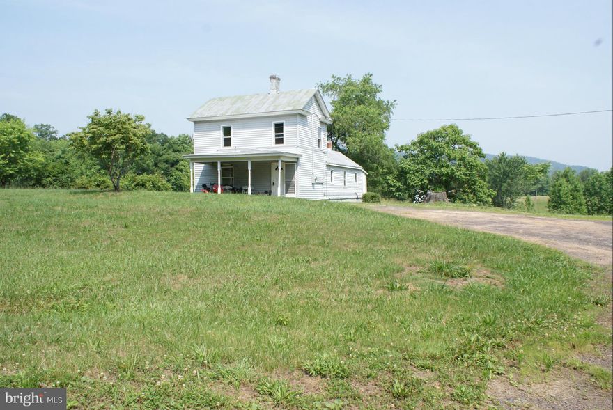 Older farmhouse on 3 acres for sale.  Sold strictly AS IS, seller will make no repairs.  Home needs extensive work.  There is no water source on property.  It is currently spring fed and spring is not on this property.  Cash only.  Value is in the land with existing drainfield and proposed reserve drainfield.