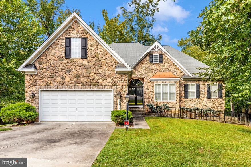 ‼️SELLER RELOCATING AND MOTIVATED‼️ Immaculate Stone-Front Retreat Backing to Woods 
This stunning single-level home with 3,900+ sqft of finished living space offers the perfect blend of elegance, comfort, and versatility. Featuring 4 spacious bedrooms and 4 full baths, the open floor plan is filled with natural light and showcases fine finishes throughout. Enjoy seamless indoor-outdoor living with a deck and screened porch overlooking a serene, wooded backdrop—your private retreat for morning coffee or evening gatherings. The expansive lower level is a true bonus: fully finished with a private entrance, it can serve as an in-law suite or income-producing rental unit, offering exceptional flexibility. From its beautiful stone façade to its meticulously maintained interior, this home delivers both charm and functionality—ready to welcome its next fortunate owner.  Go and Show! Schedule a showing today!