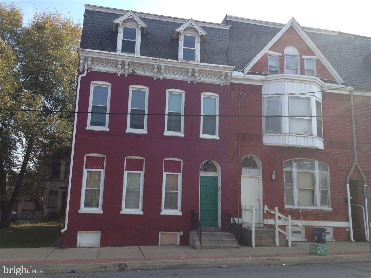 Fully occupied brick 3 unit investment property w/ completely separate electric & gas. Property in good condition for location/price including newer rubber roof, electrical & plumbing + flooring, windows, fixtures, etc as needed. Property generating good income stream; gross rent quoted already factors in a 10% vacancy rate. Some revitalization nearby w/ sidewalks/trees and Bond building. Very affordable 3 unit in the path of potential progress!