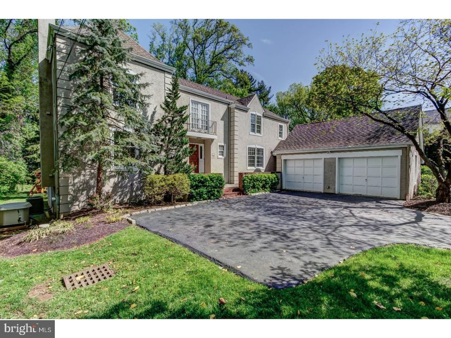 Extraordinary renovation...sprawling colonial set back on nearly half-acre lot with mature landscape on one of Penn Valley's premier streets.  Formal 2-story entry, dramatic curved stair, beautifully-proportioned living room with wood-burning fireplace opens through pocket doors to private study/office. Opposite living room is custom, island kitchen with classic shaker-style cabinetry, Wolf/Bosch appliances, natural stone counter tops and backsplash, and additional peninsula seating.  Laundry/mud room exits to garage. Kitchen opens to informal breakfast/morning room, and family room with fireplace, grandly scaled windows, and 18' vaulted ceiling. Oversized 3-season sunroom and deck complete main living level. Finished, walk-out lower level spans entire footprint of home with separate family and gym spaces. 2nd floor master suite with full wall of custom built-in storage, wood burning fireplace, and his/hers walk-in closets.  Luxe master bath clad with cararra marble, and limestone features custom cabinetry, freestanding tub, steam shower with frameless glass enclosure, separate water closet, Kohler Purist fixtures, and radiant floor heating 3 additional bedrooms and new hall bath with carrara marble, subway tile, Kohler Purist fixtures, soaking tub and separate stall shower with frameless glass enclosure. Recessed lighting with dimmers, hardwood flooring in public spaces, and new carpeting upstairs/in private spaces throughout. Newer whole-house generator. Incredible features/finishes throughout, move-in ready....