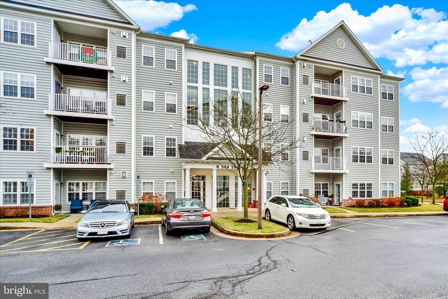 Set within the water-oriented community Hopkins Landing community, this spacious 2-bedroom, 2-bath condo offers 1,544 square feet of effortless living paired with an assigned boat slip that conveys—giving you direct access to the Middle River and Chesapeake Bay without the premium of direct waterfront pricing. Even better, the boat pier fee and front foot fee are paid through the end of 2026, offering immediate value and peace of mind for the next owner.

Inside, the home is bright, open, and move-in ready, featuring an inviting floor plan designed for both everyday comfort and entertaining. Crown molding, custom blinds, generous room sizes, and abundant natural light create a warm, polished feel throughout. The living room is anchored by a gas fireplace, flowing seamlessly into the breakfast area, kitchen, and adjacent dining space—ideal for hosting or relaxed nights at home. An in-unit washer and dryer add convenience and ease to everyday living.

The primary suite offers privacy and comfort with a custom walk-in closet and en-suite bath, while the second bedroom and full bath provide flexibility for guests, a home office, or den. Step onto the private balcony to enjoy morning coffee or unwind after a day on the water. Recent updates add peace of mind, including a brand-new water heater and a new storm door, enhancing both efficiency and curb appeal.

Perfectly positioned within the community, this second-floor unit offers easy elevator and stair access and is just a short walk to the pool, piers, walking paths, and your assigned boat slip. Leave the trailer behind—walk to your slip and be on the water in minutes. 

Hopkins Landing is a water-oriented community featuring over a mile of lighted walking paths with observation platforms, a seasonal pool, two community piers, and nearby marinas. All of this, just a short drive from waterfront dining, shopping, and major commuter routes including I-695 and I-95, with convenient access to Downtown Baltimore, Towson, and Timonium.

A rare opportunity to enjoy low-maintenance coastal living with a boat slip, community amenities, and unbeatable access—without the cost of direct waterfront ownership.

Buyer to independently verify all listing information.