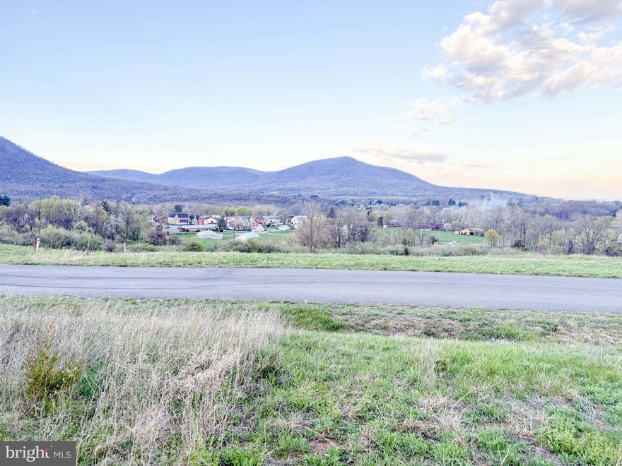 Building lot with beautiful mountain views! Bring your own builder and vision! Well required, however public sewer hookups are available through Peters Township.
No mobile homes. 2 Story home must be minimum of 1800 sq. ft. with 2 car attached garage. Ranch style home must be 1500 sq. ft. with 2 car garage attached.