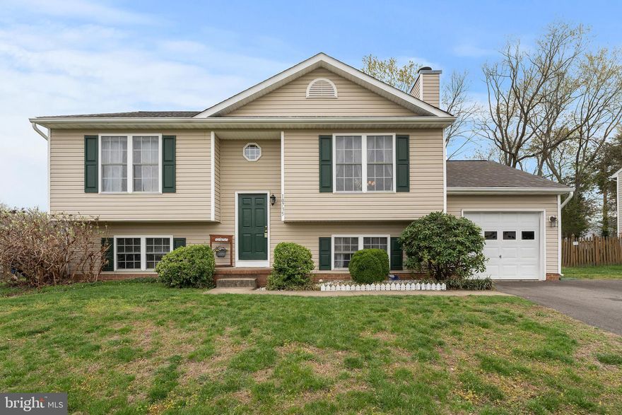 Step inside and feel right at home in this 4 bed 2 bath move in ready home in Hamilton's Crossing. Upstairs, the inviting living room with a wood-burning fireplace is perfect for relaxing,  while the open kitchen and dining area lead straight to the back deck, offering the ideal setup for outdoor dining or quiet mornings. Two spacious bedrooms and a full bath complete the upper level.  Head downstairs to discover two more bedrooms, a second full bath, and a large rec room, ready for movie nights, game days, or a quiet escape. The laundry area and extra storage provide all the practical space you need. This home has been lovingly maintained, with new flooring throughout, a new smart washer and dryer, a modern HVAC system (less than 2 years old), and a roof replaced just 3 years ago—giving you peace of mind and comfort.  Located minutes from the train station and downtown Fredericksburg, this home makes commuting easy while keeping you close to local shops, dining, and entertainment.
