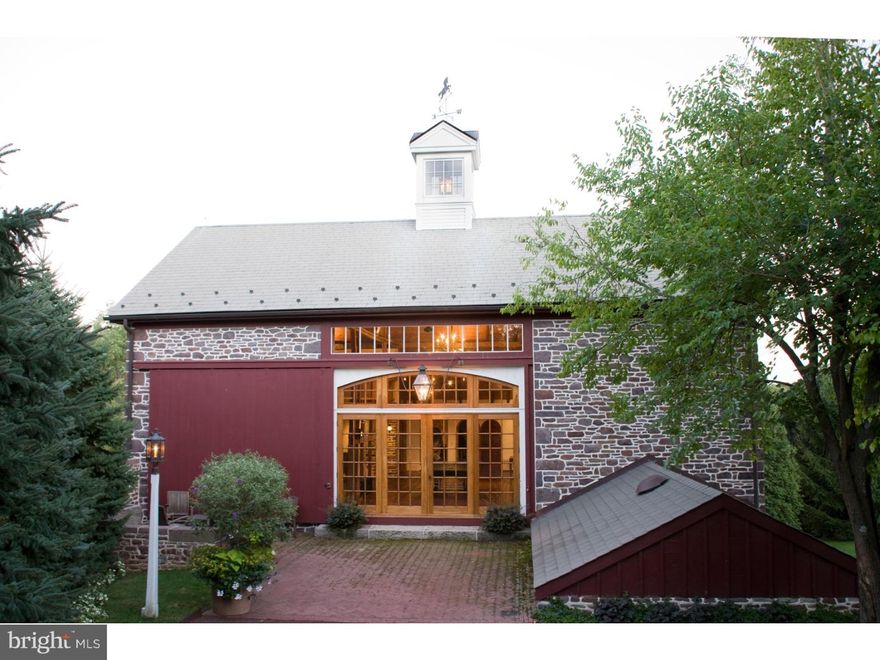 The very essence of a Bucks County Gentleman's farm is evidenced at 1st approach, with a winding drive from a private country road. This 1790s stone colonial, on 13.6 acres, offers a unique & timeless representation of the Bucks County countryside, with architectural elements throughout the stone manor house, magnificent barn & outbuildings. The original farmhouse has been appreciated & restored, boasting vintage accoutrements & architectural details such as exposed stone walls, 5 fps, butterfly staircases, random width chestnut floors, beamed ceilings, period moldings & hardware, & deep windows with old glass. And yet, it is the seamless blend of original features & new renovations that amazes & delights.  Surprisingly, a recent addition offers a great room/dining room/kitchen that will take your breath away.  Designed to enhance the home's livability, yet to preserve & meld with its antiquity, this sun-filled area has reproduction antique glass windows, exposed stone, plaster walls with period patina, & custom woodwork & cupboards. An office, living room & guest suite, all with fps, complete the 1st floor. On the 2nd & 3rd floors are 3 additional brs, 2 baths, library, laundry & balcony, which offers panoramic vistas of the protected environs. Multipurpose buildings are perfectly-positioned amidst the rolling acreage, overlooking views of horse pastures, organic gardens & specimen plantings. The stone bank barn, breathtakingly restored, provides an amazing vaulted space for entertaining in large numbers, as well as a media loft & a studio with bath, 2 kitchenettes & additional overflow guest brs.  Below, beautiful horse facilities include a tack room, stalls & walk-through horse shower.  A stone summer kitchen has 2 pizza ovens & Argentinian wood grill. A sun-filled artist's studio is above the 2-car garage. A swimming pool offers offers a pool house with bar & sound system. Accompanying these luxurious accoutrements are fabulous landscapes that have been thoughtfully planted to provide privacy & accented with a bent-grass croquet court, herb, vegetable & rose gardens, & Hawthorne allee. For the horse enthusiast, the property includes riding ring, pasture & quiet country roads on which to ride & is only 5 miles from a 2,500 acre horse park. This utterly romantic farm's magic name, Windhorse Farm, derives from the Tibetan word "Lungta", meaning "Wind Horse".  When you feel your "Lungta" you feel a true sense of well-being?like a horse running in the wind.