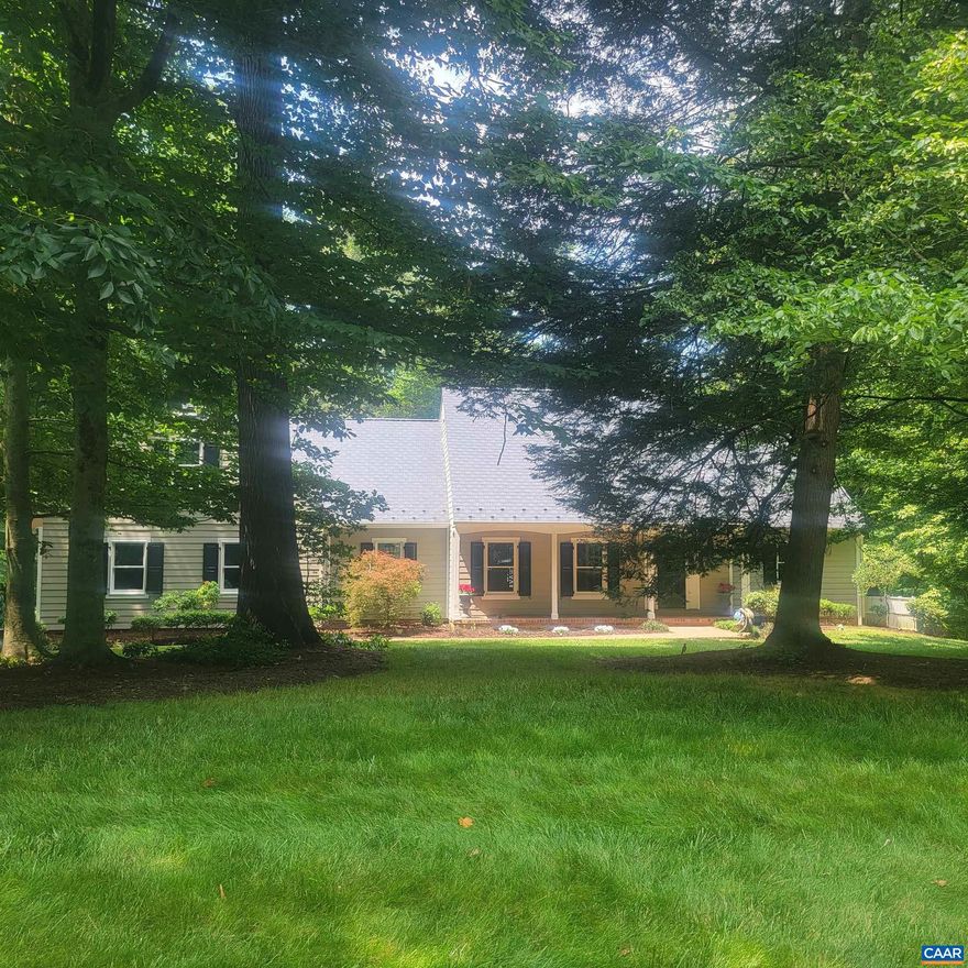 AWESEOME OPPORTUNITY TO OWN A BRAND NEW HOME ON 2.5 PRIVATE ACRES IN THE MIDDLE OF CHARLOTTESVILLE. This beautiful home has been totally rebuilt and is ready for new owners. Large covered front porch to enjoy the privacy.  Rear deck overlooking private backyard and pond. Home features one level living with first floor master with ensuite bath; Spacious brand new gourmet kitchen with white cabinets, granite countertops, stainless steel appliances and hardwood floors; formal living and dining room; family room with fireplace and built-in shelving; main level laundry room.  Upper level features 3 large bedrooms one with walk-in closet; jack and jill bathroom and unfinished attic space for storage or future square footage. Walkout basement is finished with woodstove.   Pictures coming soon.,Granite Counter,White Cabinets,Fireplace in Family Room,Fireplace in Rec Room