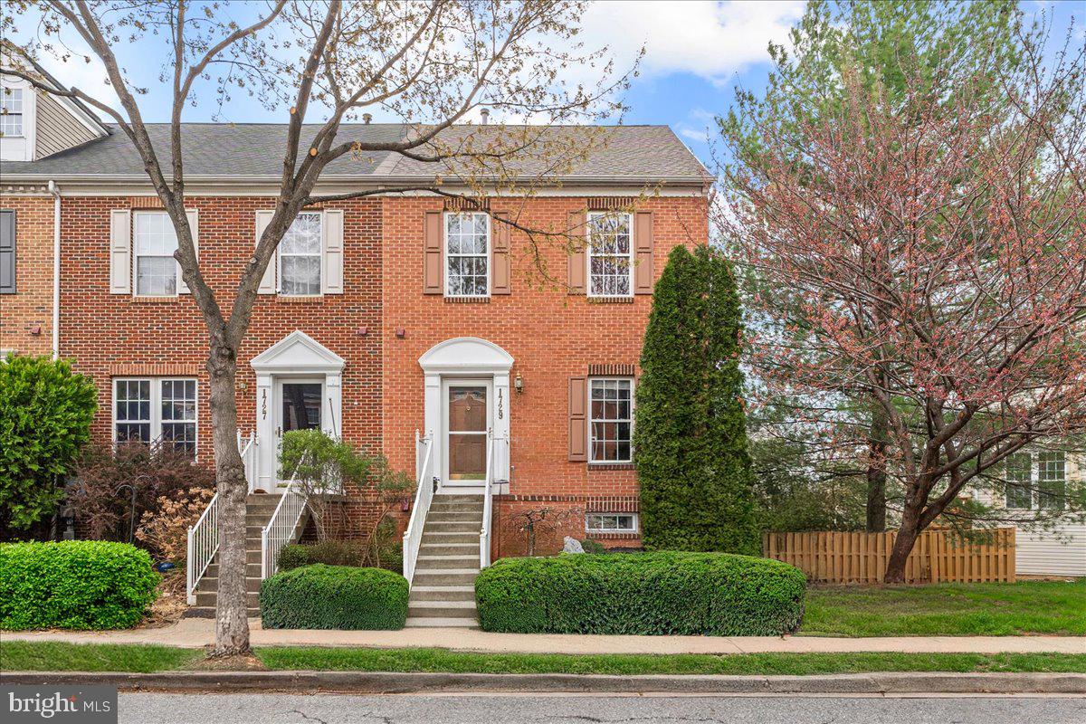 Welcome to this beautifully maintained brick-front end-unit townhome in the highly desirable Dearbought community. Gleaming hardwood floors greet you as you enter the main level, which has been freshly painted. The kitchen features 42" white cabinetry, a stylish gray island, granite countertops, and a pantry. Just off the kitchen, there’s a cozy breakfast area, a family room with a gas fireplace, a sliding door leading to a Trex deck where you can enjoy the gorgeous sunsets, and a fully fenced backyard with two paved parking spaces. The front room boasts a charming bay window bump-out that fills the space with natural light. The newly carpeted upper level offers a generously sized primary suite with a sitting area, an expansive walk-in closet with built-in organizers, and a luxurious en-suite bath with a soaking tub, separate shower, and double vanities. Two additional bedrooms and a full hall bath complete the upper level. The fully finished lower level adds even more living space with a fourth bedroom, full bath, and a versatile recreation room. Dearbought’s HOA takes care of the lawn maintenance, so you have time to enjoy relaxing in your new home! Major updates give you peace of mind: the roof is just 6 years old, and the HVAC system was installed in 2022. This home is near local shopping, restaurants, major commuter routes, and Downtown Frederick. Welcome home!