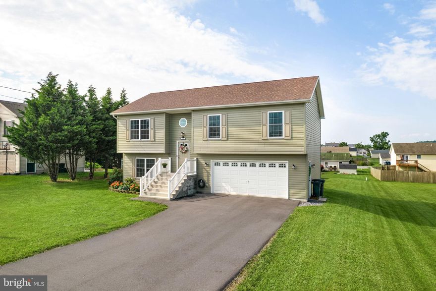 Welcome Home!  This immaculate 3 bed, 2 bath home has been impeccably maintained and updated with custom touches throughout.   From the moment you enter, you will see the pristine condition of this property and how it has been cared for.  Upgraded flooring, light fixtures, faucet, granite and custom backsplash in the kitchen. The dining area opens to the rear deck which overlooks the large back yard, which comes with a shed and play equipment (if desired).  The Primary Bedroom has a full bathroom with upgraded vanity and fixtures.  The walk out basement offers additional recreational space to use as you like as well as additional storage.   Asphalt driveway leads to 2 car garage with side service access door to yard.