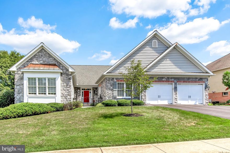 Looking for one floor living with unparalleled details and amenities situated on a park like setting?  Come take a look!  Enjoy the fabulous gourmet cooks kitchen with a bright eating nook overlooking the courtyard. The main living level boasts a great room with vaulted ceiling, gas fireplace and built-ins, sun room that opens to the patio, spacious dining room and first floor office.  The master bedroom offers hers and his walk-in closets and a luxurious bath with a walk in shower.  The lower level has a wet bar, full bath, gym room and outside entrance.  Lovely landscaping accents the exterior of this beautiful home and the patio offers great views of the private yard.  Plenty of room for a pool if you would like to add one.