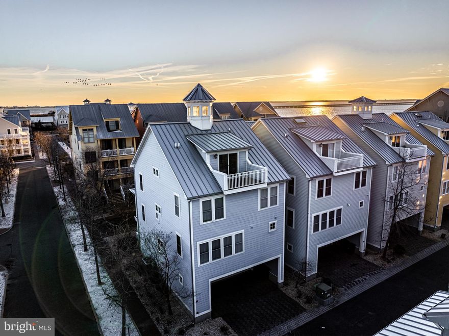 Seize the opportunity to elevate your lifestyle with a stunning residence in the coveted Sunset Island
community. In the past year, only three of these exquisite single-family homes have found new owners, making this your exclusive chance to upgrade your living experience. Nestled in the heart of
Sunset Island, this 5-bedroom home, featuring an additional den, beckons with unparalleled views of
the Assawoman Bay and its mesmerizing sunsets. Act swiftly to immerse yourself in the beauty of all seasons or capitalize on the potential for significant rental income. Making this not just a home, but a savvy investment. This distinguished property offers a harmonious blend of luxury and functionality, ensuring a lifestyle tailored to your preferences.

Step into a world of comfort and elegance with two front porches and a rear balcony that amplify the
charm of your surroundings. Positioned as an end cap, the Easterly exposed side showcases a
remarkable 11 windows, bathing the interiors in natural light and creating an ambiance of warmth and
openness. Your new home is thoughtfully designed with four full baths, complemented by a convenient powder room adjacent to the kitchen and dining area. An oversized laundry room adds a practical touch to
daily living. The allure continues with the inclusion of a two-car garage and two parking pads, providing ample space for your vehicles. As an extra indulgence, relish in the luxury of a spacious outdoor enclosed shower, an oasis of tranquility.

Opportunity is knocking, and it fervently awaits your response. Schedule a tour today to embark on
the journey toward elevated living in the heart of Sunset Island. Don't miss your chance to make this
exquisite residence yours and savor the lifestyle you've always dreamed of.