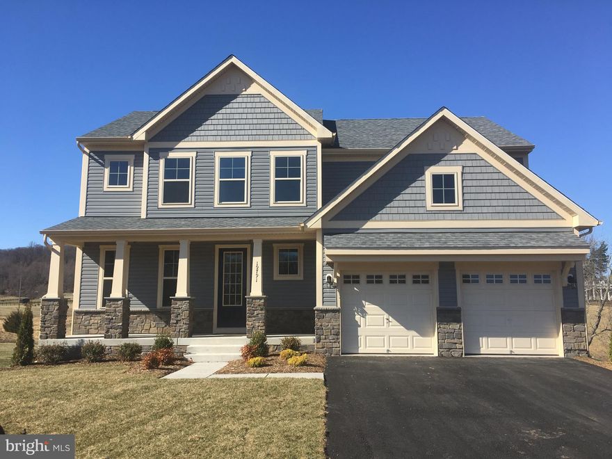 Located a mere 1.5 miles from downtown Leesburg right off Route 15 the Wulf Crest community offers luxurious single family living in a pastoral setting. This community is steps away from the American Academy of Equestrian Sciences. You can walk to horse back riding. This home provides peace and quiet with all the neighborhood comforts you want.