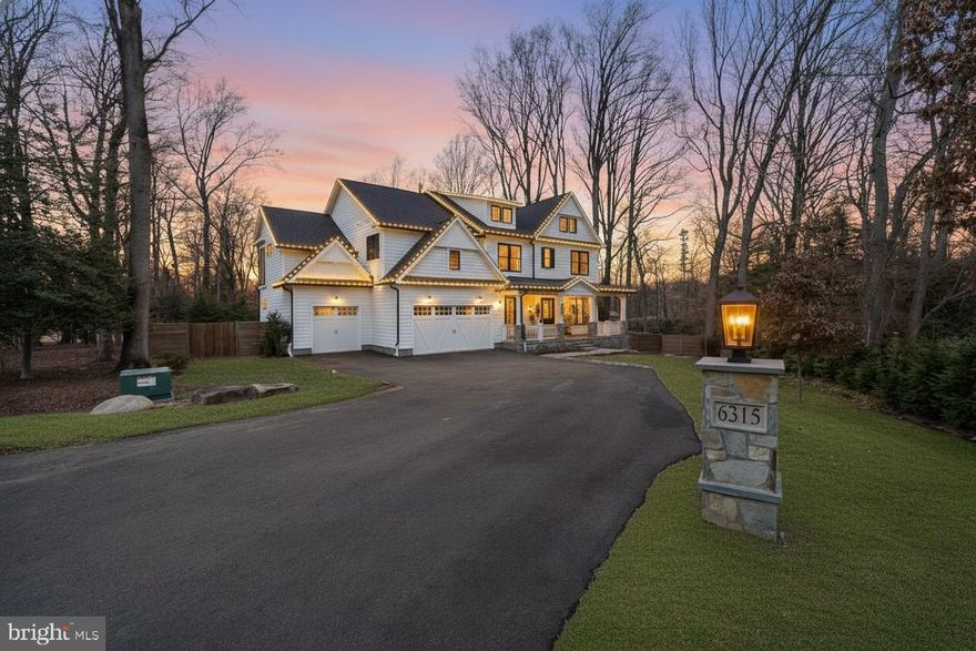 Welcome to 6315 Tilden Lane, an exceptional custom residence built by Mid-Atlantic Custom Builders in 2022, ideally situated on a beautifully landscaped ¾-acre lot in Rockville’s coveted Luxmanor community. Offering 7 bedrooms, 7 full baths, 2 powder rooms, and over 7400 square feet of exquisitely finished living space across four levels, this home seamlessly blends sophisticated design with everyday functionality.

The main level impresses from the moment you enter, featuring a grand foyer accented by herringbone white oak flooring. Designed for both elegant entertaining and comfortable living, the home includes a private main-level bedroom suite with spa-inspired bath, a thoughtfully designed mudroom with custom built-ins off the three-car garage, and a stunning study with gas fireplace.

At the heart of the home is a show-stopping chef’s kitchen by Stuart Kitchens, showcasing frameless custom cabinetry, designer quartz countertops, a statement tile backsplash, and two expansive islands with generous seating and prep space. Premium appliances include two Asko dishwashers, a Wolf six-burner range with hood, and a Sub-Zero 60” refrigerator/freezer. A walk-in pantry, butler’s pantry with sink and beverage refrigerator, formal dining room, and an inviting family room with coffered ceiling and gas fireplace complete the space. Enjoy seamless indoor-outdoor living with access to a screened porch with gas fireplace and an adjoining deck overlooking the private backyard.

The second level is anchored by a luxurious primary suite featuring a sitting area, private terrace, dual walk-in closets, coffee bar, and a flexible adjoining room ideal for a nursery, office, or retreat. The spa-like primary bath offers dual vanities, a freestanding soaking tub, and an expansive glass-enclosed shower. Three additional en-suite bedrooms, a well-appointed laundry room, and a versatile open sitting area complete this level.

The third level offers an additional bedroom and full bath, a dramatic loft with cathedral ceilings and skylights, a wet bar, and access to a private sky terrace—perfect for relaxing or entertaining under the stars.

The fully finished lower level is equally impressive, featuring a spacious recreation room with wet bar, a temperature-controlled wine wall, exercise/media room, additional bedroom with full bath, powder room, generous storage, and walk-up access to the backyard.

Recent enhancements include a whole-house reverse osmosis water filtration system and a fully fenced cedar privacy enclosure surrounding the backyard, creating a serene and secure outdoor oasis.

Ideally located, Luxmanor offers effortless access to an exceptional array of nearby amenities and commuter routes. Residents enjoy close proximity to Pike & Rose, Wildwood Shopping Center, Downtown Bethesda, and Rockville Town Center, with a wide selection of dining, shopping, and entertainment options just minutes away. Major commuter corridors including I-270, I-495, and Rockville Pike provide seamless connectivity throughout the greater Washington, DC metro area. The White Flint and Grosvenor–Strathmore Metro stations are each approximately two miles away, offering convenient access to public transportation while maintaining the peaceful, residential setting Luxmanor is known for.

This extraordinary residence offers unparalleled craftsmanship, thoughtful design, and refined luxury in one of Rockville’s most prestigious neighborhoods—a rare opportunity to own a truly turnkey custom home in Luxmanor. Reach out to us to schedule your private tour today!