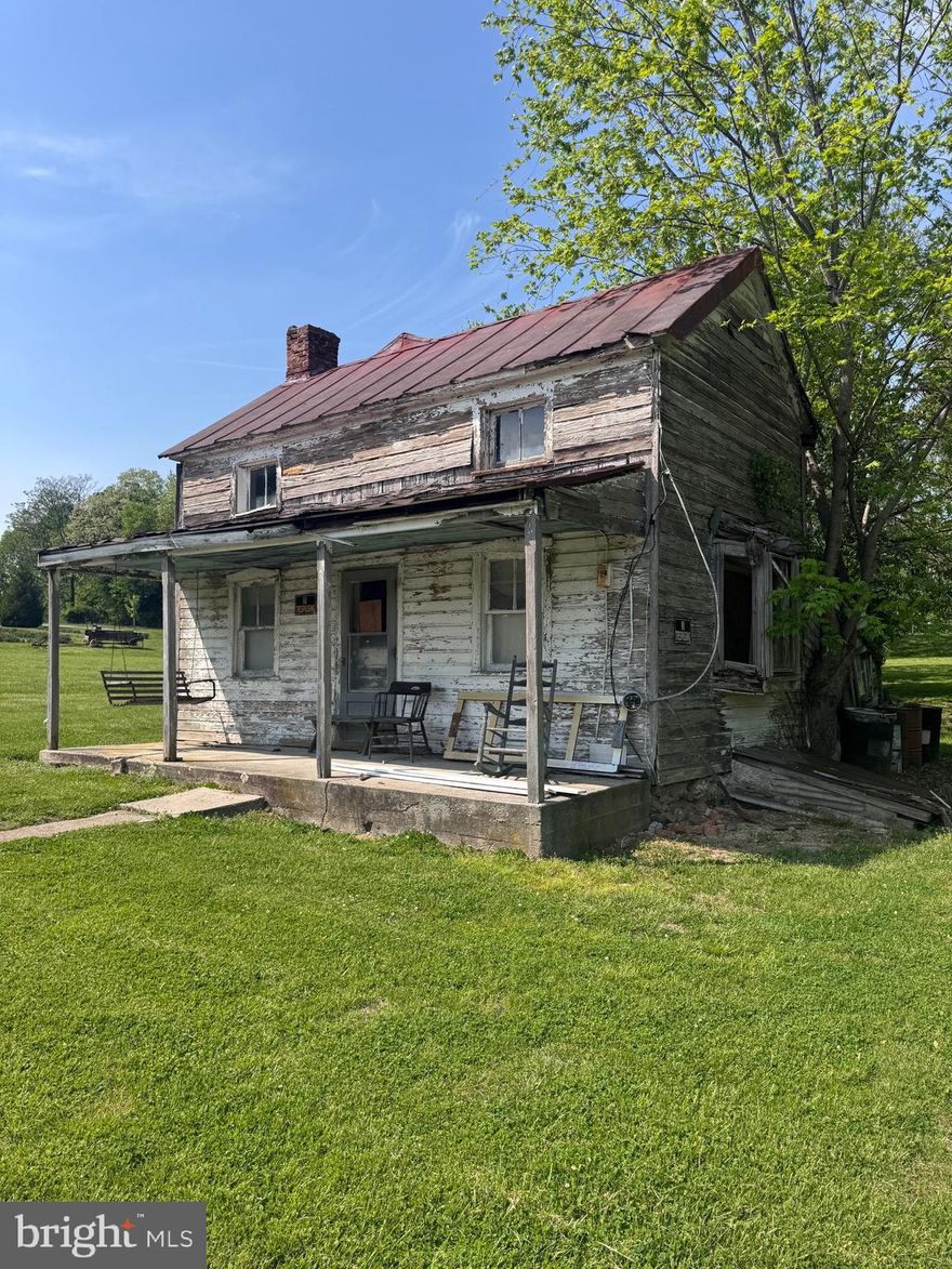 An incredibly rare chance to own one of the oldest historical properties in Harpers Ferry WV, this 0.18-acre lot in one of the most sought-after areas. Located on quiet and charming Putnam Street, this property is just a short 3-minute drive from the heart of historic downtown, known for its quaint shops, scenic hiking trails, and the natural beauty of the Shenandoah and Potomac Rivers. 
This is a unique opportunity to restore a home with so much history or potentially build new in a location rarely offered to the public. Whether you're envisioning a custom primary residence, a weekend retreat, or a long-term investment in one of West Virginia’s most iconic towns, the potential here is exceptional.
Property is being sold strictly as-is. Buyer to perform all due diligence regarding zoning, permitting, and future use.  Any demolition or new construction will require proper approvals through the local Board of Zoning Appeals.