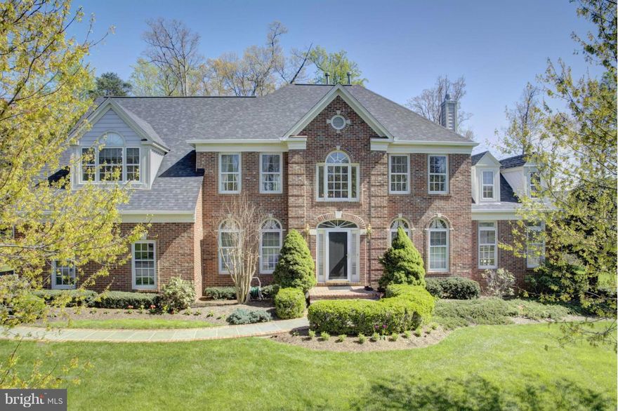 Huge Reduction! Classic brick front SFH located at 36K lot sizes, 5500 sq. ft. Brand new carpets, freshly painted, rich hardwoods, an abundance of windows, stone FP, updated kitchen w new and newer applicances, bath, deck, new roof......much more.. Huge MBR accented by skylighted MBR. Ample closet spaces. Fully finished walk up basement. Bring us an offer, let's talk. Oakton High School Pyramid.