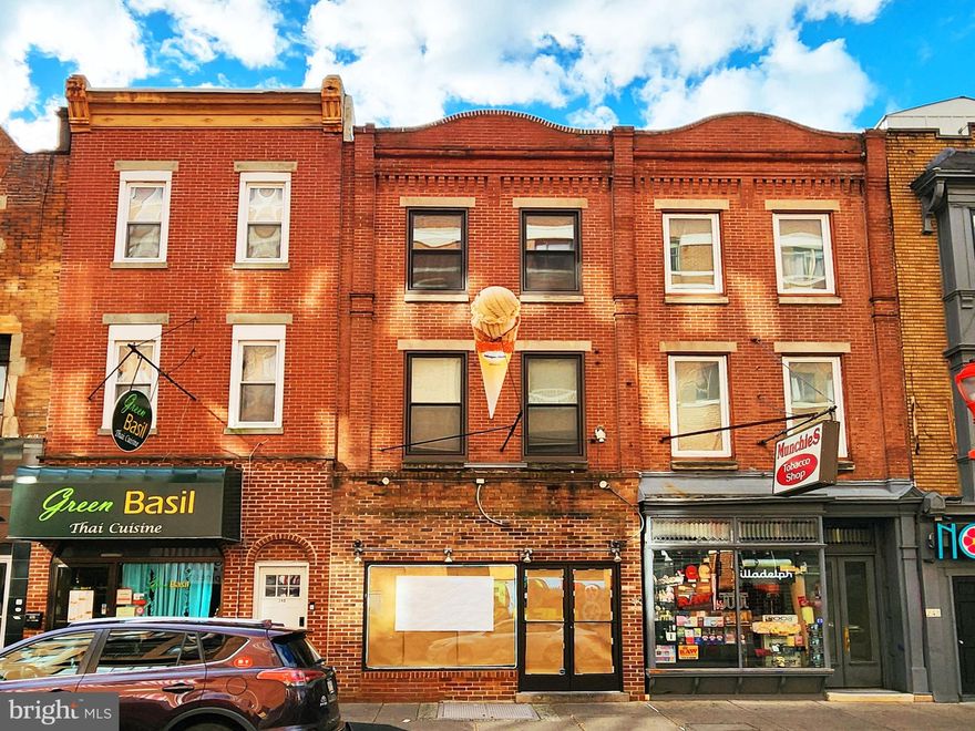 Welcome to South Street!! This Mixed-Use Residential-Commercial building is perfect for an owner-occupant store + residence. Positioned along the renowned South Street Commercial Corridor, this property unveils a  turn-key Ice Cream store, complete with all equipment and features, along with a 1,200 square foot, bi-level, 1-bedroom apartment with a roof deck with outstanding views of the city and skyline! The store space is ready for use while the apartment unit is tenant-occupied at $1,500 per month. Step into the next generation of the South Street Commercial Corridor!