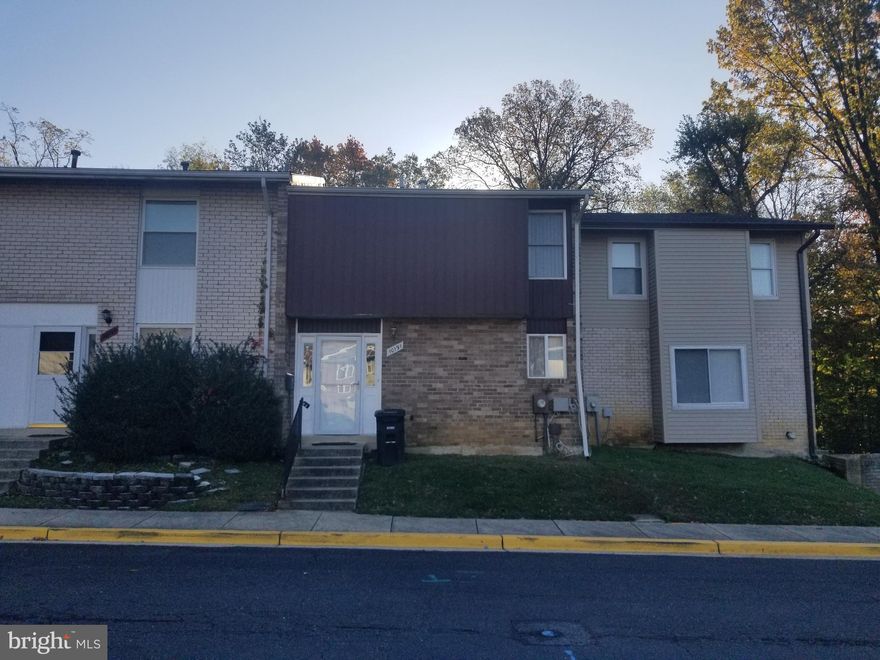 FHA Approved Community. Large Spacious Townhouse with 3 Bedrooms, two full baths and one half bath. Home shows pride of ownership and has been well maintained. Home has large spacious basement with 8 foot ceilings and walks out to a large rear yard. Two Assigned Parking Spaces. Kitchen has granite counterparts and stainless steel appliances.