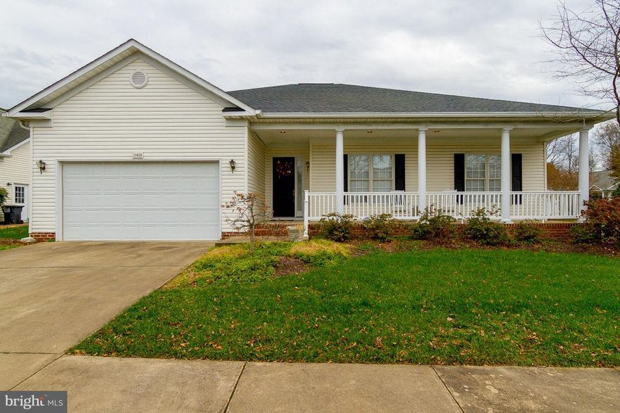 This Gorgeous 1 level home has large spacious floorplan with over 2500 sq ft of living space.  Den/optional 3rd bedroom  option .  Large master suite with oversized walk-in closet, large master bath with  separate soaking tub, walk in shower, grab bars.  Additinal features include: Large kitchen with island, Screened porch off kitchen, Sun room with Gas FP  and  Large Living Room, formal dining room combination.  High ceilings in the home with recessed lightling make this a  very spacious home.  One of the Largest lots in the community. Great location towards the back of community into cul de sac.  Must See this beautiful home!