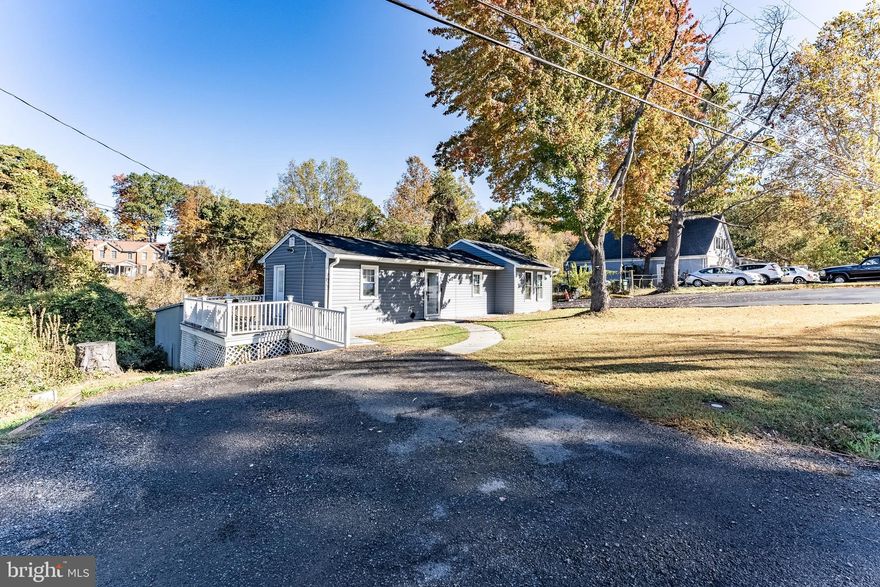 Welcome to 7822 Oak Street in Manassas — a beautifully updated home on nearly a full acre of land! This charming 2-bedroom, 2-bath property sits on a .9183-acre lot, offering endless potential to expand or build your dream outdoor oasis.
Inside, you’ll find an inviting open layout featuring a modern, updated kitchen, two renovated bathrooms, and a spacious primary suite with a cozy seating area. Enjoy peace of mind with newer roof, HVAC, siding, recessed lighting, and appliances — all the major updates are done for you.
Step outside to a large deck perfect for relaxing or entertaining, and take advantage of ample parking for up to six cars. With plenty of room to grow, this home offers the perfect mix of comfort, style, and opportunity — just minutes from shopping, dining, and commuter routes.