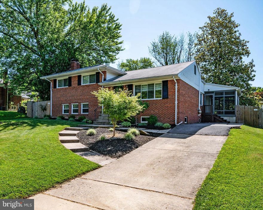 Boasting four finished levels of living space, this freshly renovated home with addition, boasts an open floor plan that includes a recently renovated custom gourmet kitchen with abundance of counter space & cabinetry, commercial-grade stainless steel appliances including 5 burner gas cooktop and wall oven, quartz countertops including 8' X 6' island  with seating space, under cabinetry lighting, pantry and tiled backsplash,  kitchen is open to main level living room and family room with cathedral ceiling, 4 skylights  and array of windows to capture natural sunlight with access to 9 x 16 screened porch and rear deck , Gleaming hardwood floors throughout the main and upper level! Upper level offers 3 well-sized bedrooms including primary bedroom with remodeled private bathroom with rain shower faucet in tiled shower, Hall bath was also updated and offers a tub/shower, upgraded vanity & fixtures and tiled surround & floor, A second family room greets you just a few steps down from the main living with wood burning brick fireplace.  A 4th bedroom and 3rd full remodeled bath is also located on this level along with the laundry/utility area,  And if all this isn't enough? There is ANOTHER finished level with 3rd family/recreation room, office/playroom/gym/5th BR  all with recently installed laminate flooring , recessed lighting and utility room with mechanicals and door to outside,   Roof installed 2012, HVAC installed 2012, Water Heater 2009   The outdoor space has been nicely landscaped and offers a rear fenced yard,  deck off kitchen that leads to paver patio, lawn & garden space (with irrigation to garden space), screened porch and includes an oversized shed for all your outdoor equipment and outdoor toys,    There is a lot to love about this home including all the attention to detail and finishes but it isn't often that you find a home that the floor plan offers living space, so everyone has the rooms and space to spread out and enjoy.   This property is conveniently located to the recently rebuilt Burnt Mills Elementary School (2023), the Northwest Branch trail entrance and easy access to desired services and amenities which include grocery store and coffee shops within walking distance, 5 minute commute to Sligo Creek Trail and commuter distance to the DC, Baltimore and Annapolis areas.