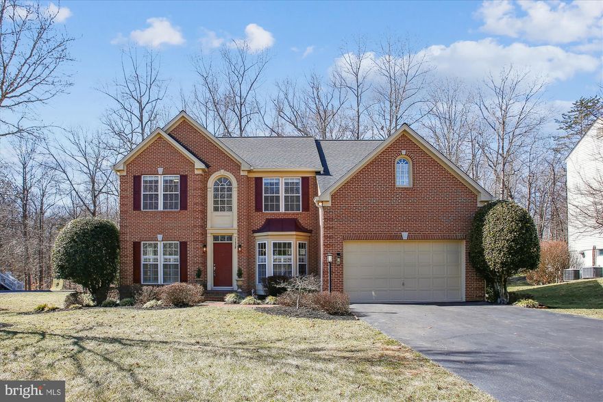 Gracious, Spacious Colonial located in Sought After Lakeridge/ Crest Ridge Estates.  Backs to woods, Large Windows, and Updates throughout.  The Main Level Formal and Informal Living Space Offer the Best of Both Open Concept and Traditional Floor Plans, with Formal Dining, Sitting and Library spaces just off the Entry Hall and the Family/Great Room adjacent to the Gourmet Kitchen which opens to the Upper-Level Deck. The Upper-Level features a Roomy and Private Upper- Level Primary Suite, and Three additional Upper-Level Bedrooms.   The Lower Level is Fully Finished and Features a Huge Recreation Room opening to the Rear Lower-Level Deck, a Den/Office/Bonus Room, Full Bath, and Generous Utility/Storage Room.   A Two Car Garage and Landscaped Lot complete this Outstanding Property.  Enjoy Community Amenities including Paths and Common Areas.  Convenient Location Minutes to Shopping, Schools, Parks, Old Town Occoquan and More.