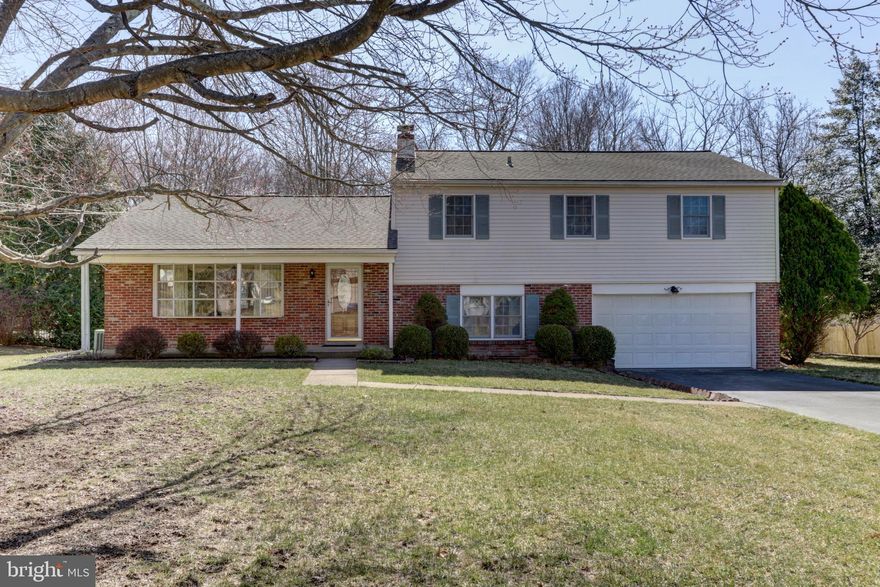 Welcome to 562 Mallard Drive, New Britain Township, in sought after Central Bucks School District and the Tower Hill neighborhood.  Post midcentury modern, this classic split level was the builder's model home in 1970.  It's the only home in the neighborhood with the extra-large bow, picture window in the living room.  A bonus to this location is that it backs to woods.  A well cared for home that features 4 bedrooms, 2.5 bathrooms, hardwood floors, and a whole house Generac generator. Not to be missed is the spacious family room with fireplace and French doors to a backyard patio. The kitchen has granite countertops, Craftmaid cabinets, ceramic tile floors and backsplash, garbage disposal and a new faucet. The upper floor of this split-level home features bedrooms that are larger than you'd find in most recently built houses. The primary bedroom has a walk-in closet where you can access the attic storage too. A stall shower bathroom in the primary has ceramic tile flooring. One of the other bedrooms also has a large walk-in closet.  No shortage of storage here. There's a full basement for storing extra things, a garage and attic.  This property offers a comfortable living space and presents a terrific opportunity for buyers seeking a charming home convenient to Peace Valley Park, Doylestown, Chalfont Boro, shopping centers, restaurants and regional rail train stations. There are sidewalks throughout the neighborhood for an easy walk to the ballfields around the corner.  Mature landscaping with perennial plants.  A well-maintained lawn is ready for your seasonal outdoor games just in time for spring and summer.  Licensee is related to seller.