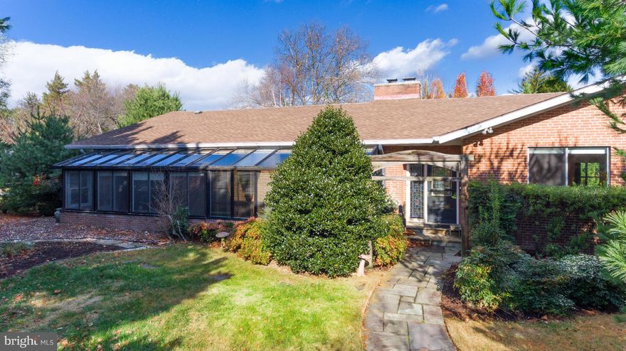 Expansive all brick Stevenson Rancher on corner lot.  Features 3,700+/- sq.ft., 4 bedrooms, 5 full baths, 1 half bath, master bedroom with 2 baths and enclosed glass porch, large country kitchen, sun room, finished lower level, 2 car garage and  2 driveways. Great outdoor space with pool, patio and privacy.  Perfect for entertaining!