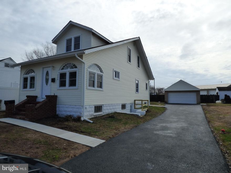 Great old home. Almost everything was redone. A totally new kitchen with new stainless steel appliances including refrigerator. Luxury vinal tile. Ceramic tile back splash. Large Dining room original hardwood refinished. Living room has a beautiful staircase and refinished flooring. Enclosed front porch with heat and air. First floor bedroom. 2nd floor 2 nice sized bedrooms with larger closets for a older home. New redone full bathroom. New windows throughout, new doors inside and out, New AC unit and ductwork. New 200-amp electric service.  New driveway sidewalks to the front door and back door patio. Oversized 2 car detached garage.