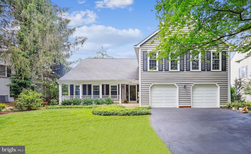 Elegantly updated and ready to enjoy! Impeccably appointed large colonial with modern proportions in highly sought-after Orchard Ridge, nestled on a quiet, tree-lined cul-de-sac. Upon arrival, you’ll be enchanted by the delightful covered front porch and brick paver pathway. This home features exquisite finishes, including vaulted ceilings, renovated bathrooms, wood flooring, modern ceiling fans, and refined architectural details throughout.
The main floor includes a welcoming foyer with oversized tile flooring, a spacious, light-filled living room, and an open dining room with chair rail molding. The updated gourmet kitchen and breakfast room flow seamlessly into the inviting family room, which showcases a marble-surround fireplace accented by shadow box molding and offers access to the backyard. The granite kitchen is a culinary delight, featuring GE Profile stainless steel appliances, handsome cabinetry, a pantry, and a large sun-drenched breakfast room that opens to the rear patio and includes a convenient built-in buffet. The main level is complete with a renovated powder room.
Upstairs are four sizeable bedrooms and two tastefully renovated full bathrooms with porcelain finishes, including a primary suite featuring a striking electric fireplace, cathedral ceilings, a modern ceiling fan, LED lighting, a decorative nook, a walk-in closet, and two additional wall closets—all with organizing systems. The primary bath is a standout feature, with a glass-enclosed shower clad in stunning porcelain tile with beautiful veining, pebble stone flooring, a rain showerhead, a shower wand, and a niche, along with two pedestal sinks and a soaking tub. The secondary bedrooms also have closet organizing systems, and two include sleek ceiling fans. All bathrooms in the home were renovated in 2022!
The finished lower level provides flexible living space and boasts a recreation room, a guest room/den with a closet, an office, a renovated full bathroom, and a laundry room with LG energy-efficient washer and dryer on elevated drawers, plus ample storage.
The captivating grounds have been meticulously maintained, showcasing lush, established landscaping and an expansive brick paver patio. The property includes an attached two-car garage with a built-in workbench—ideal for projects or additional storage—and is ideally situated in a welcoming community with sidewalk-lined streets. Enjoy convenient access to parks, shopping, and major commuter routes including I-270 and I-495. Just steps away is the Rockville Millennium Trail—Rockville’s 10-mile bicycle beltway loop.
Zoned to Richard Montgomery High School (International Baccalaureate program), Julius West Middle School, and Ritchie Park Elementary.