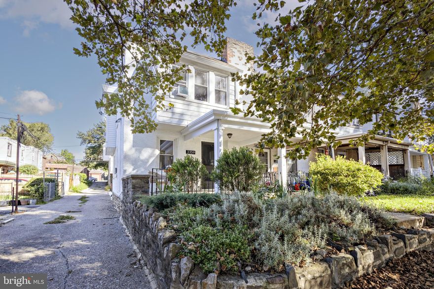 End of row 3 bed/1 bath charmer with parking in lovely East Falls!  Located on a tree-lined block, the welcoming energy of the home is evident as soon as you walk up and see the pollinator friendly front garden and cute covered porch.  Upon entering there is a spacious living room that leads to the modern, open concept kitchen.  The kitchen features a large island, stainless steel appliances, wood cabinets and tons of cooking and prep space.  Off the kitchen there is an awesome back deck that's perfect for grilling and relaxing.  Beyond that there is a dedicated private driveway parking spot!  The lower level is a full finished basement with brand new carpets that offers a washer/dryer and additional work or entertaining space.  Upstairs there are three good sized bedrooms and a full bathroom.   This lovingly maintained house has it all- tons of character, hardwood floors throughout, abundant natural light, parking, two outdoor spaces and a great location.  Recent updates include: electric rewiring (2021), new trex back deck (2023), new back door (2024), new dryer (2024) and new dishwasher (2025).   Enjoy being near the library, McMichael Park, shops and restaurants,  public transportation, easy access to major roads and so much more.  Move right in!