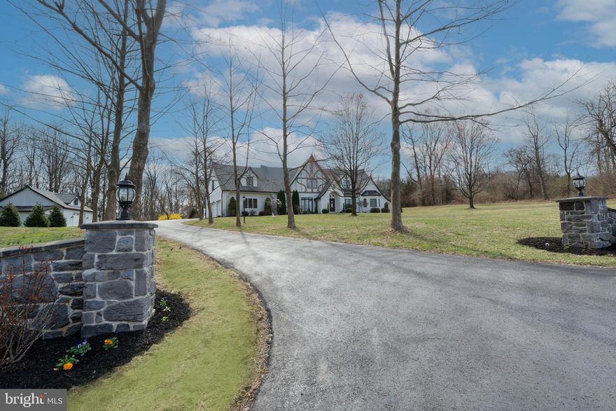 Nestled on a sprawling 3.6-acre estate near Middle Creek, historic Schaefferstown, and just outside of Lititz, this custom-built masterpiece by Larry Fox Builder is more than a home—it's an invitation to serenity and inspired living. Positioned near a stunning wildlife preserve where you can witness the breathtaking snow geese during their migration in their natural habitat, this property offers a connection to nature like no other. Crafted to the owners' unique vision, every detail of this magical residence exudes charm and thoughtful design. The grand foyer, where hardwood floors, a vaulted ceiling, and a coat closet set the stage for elegance, welcomes you warmly. The formal dining room, adorned with a sparkling chandelier, hardwood floors, and intricate crown molding, offers the perfect setting for intimate gatherings. Adjacent lies the cozy living room, carpeted for comfort, and a small study—a quiet retreat for work or leisure. The heart of the home is the great room, complete with a warm gas fireplace, hardwood floors, built-ins, and recessed lighting, creating an inviting ambiance. The adjoining kitchen is a chef's dream, featuring hardwood floors, wine storage, a center island with seating and pendant lights—all blending form and function. Step outside to your private two-level patio with two pergolas and a tranquil center fountain—an idyllic space to unwind or entertain. The first-floor primary suite is a haven of luxury, boasting a lighted tray ceiling, dual walk-in closets, and a spa-inspired bath with a whirlpool tub, double sinks, and stall shower. Upstairs, you'll find three additional bedrooms, two full baths, and carpeted floors, creating a warm and welcoming environment. Designed with convenience and efficiency in mind, the home includes a whole-house fan to enhance cooling and ventilation. There's even a separate man cave, complete with a four-car garage, smoke fan, half bath, and extra storage space above—a perfect retreat for hobbies or projects. Surrounded by nature, this property features an expansive backyard for outdoor activities, is situated near scenic walking trails and Mill Creek, and enjoys its close proximity to the area's rich historic and ecological treasures. With its distinctive curb appeal and blend of luxurious comforts, this home offers a lifestyle of peace, beauty, and possibility that few can imagine but all can enjoy. Don't miss the opportunity to explore this enchanting property—schedule your private tour today!