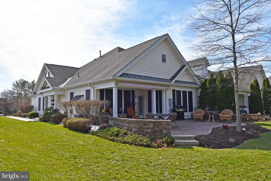 Welcome to easy living at DVCC! One level living at its BEST is offered here with this desirable end unit on 16th green. Large, extended paver patio to enjoy. 2 car garage + across from convenient visitor parking lot. Hardwoods throughout, fireplace, granite, stainless appliances.Newer and upgraded HVAC 2 +/- years ago. Extra shelving in laundry room, garage, and custom master closet organizer.