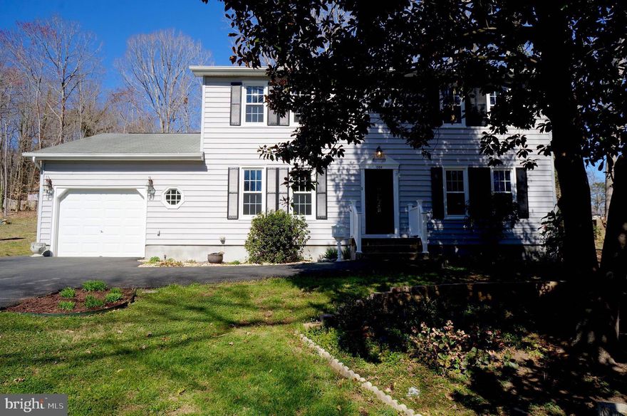 BRAND NEW ROOF BEING INSTALLED 4/22!  Move-In Ready 4 Bedroom, 2.5 Bath, 2 Level Colonial in First Section of Amenity-Filled Aquia Harbour. This Beautiful Home has Been Renovated to Open The Floor Plan and Maximize the Usability! Features Include Hardwoods and Ceramic Flooring throughout the Entire Home, other than Laundry Room (Vinyl); Recently Remodeled Kitchen with Merillat Masterpiece Raised Panel Cabinetry with Soft Close Doors and Drawers, Pull-Out Trash Bins, Pull-Out Shelving, Lazy Susan and Crown, French Door Refrigerator, Energy Star Dishwasher and Recessed Lighting; Huge Living Room with Electric Fireplace, Built-In Bookshelves and Updated French Doors to Rear Deck; Huge Laundry Room with Abundant Cabinetry including Panty Cabinet, Whirlpool Cabrio Dryer and Energy Star Washer and Door to Rear Yard and Garage; Hardwood Staircase; All Good Sized Bedrooms including Owner's Bedroom with 2 Closets and Updated En Suite Full Bath with Full Ceramic Tile 1/2 Wall, Updated Vanity, Solid Surface Vanity Top and Moen Faucet. Just as Much Attention has Been Paid to the Exterior with a Paver Stone Entrance and an Updated Culvert with Headwalls; Maintenance-Free Vinyl Siding and Soffits and Wrapped Window Trim; Vinyl Double Pane, Double Hung, Tilt-in Windows; Additional Parking Pad for Extra Cars, Boat or RV; 20x11 Concrete Rear Patio; 19x12 Rear Deck with Steps to Rear Yard and 12x10 Shed. Finally, the Systems too have been Updated with a recently replaced Water Heater and 2016 Trane Heat Pump with Electronic Air Filter. All this just seconds from the Front Gate and Close to the Harbour Inn, Pool and Full Service Marina with Boat Ramp. Other Community Amenities include 24-Hour Manned Front Gate, Fire Department, Certified Police Force (Not Security Guards), Golf Course with Driving Range, Putting Green and Country Club, Famous Clubhouse at Aquia Harbour Restaurant, Horse Stables, Riding Trails, Several Parks, Coop Preschool, Fishing Piers, Kayak Launches and SO Much More.