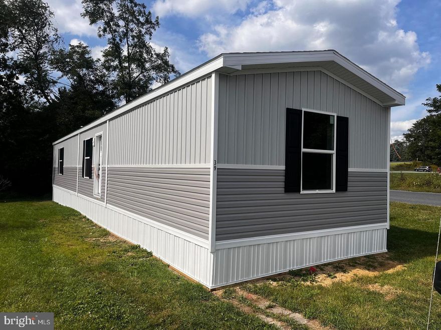 Brand New Clark 16x66 manufactured home. 3 bed, 2 bath, large living room and kitchen area on a corner lot. If this home doesn't suit we have two others and will also order you a home of your choice for one of our vacant lots. Lot rent is $325 a month. You don't want to miss out on this one! Buyer must receive community approval prior to settlement