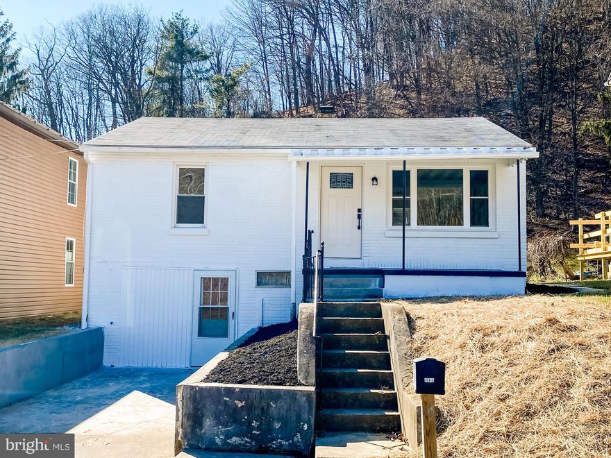 This is it!! A picture perfect rancher just outside of Frostburg! And WOW, what a charmer! MOVE-IN-READY!!! You'll LOVE the open floorplan, NEW kitchen, NEW stainless steel appliances, sparking NEW tiled Bathroom, NEW heat pump (Oil Furnace left in place for secondary heat source), fresh paint, NEW flooring, and SO MUCH MORE! Make your appointment TODAY! One year home warranty included!