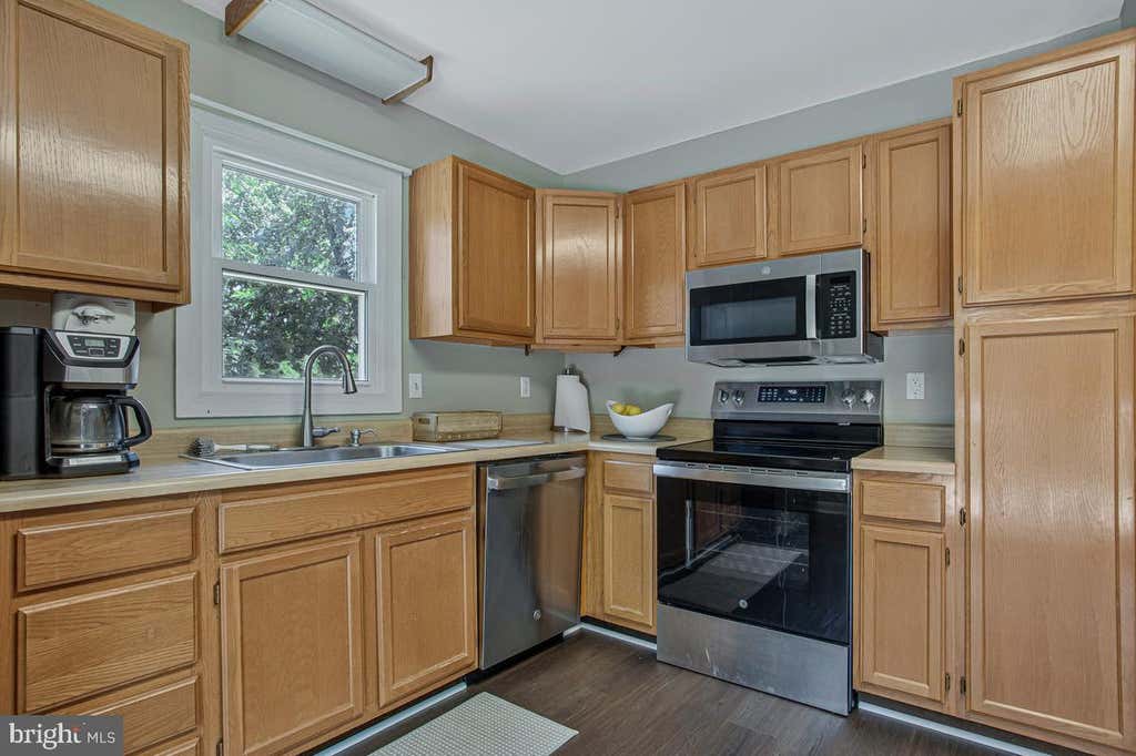 Photo of 2811 Glasgow Way, CHESAPEAKE BEACH, MD 20732 (MLS # MDCA2027878)