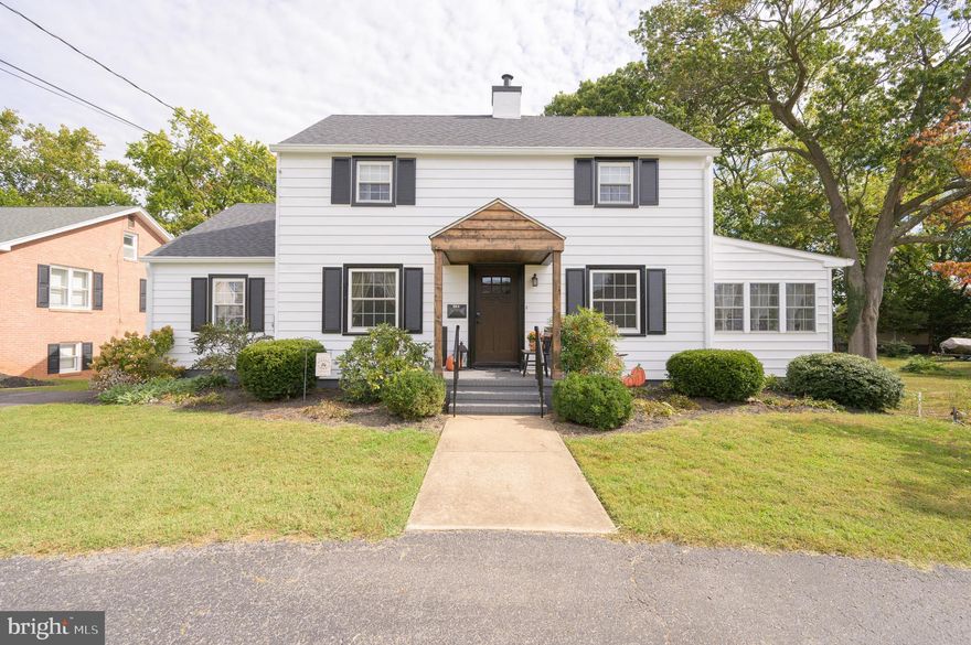 THIS HOUSE CURRENTLY HAS MULTIPLE OFFERS- ALL OFFERS HIGHEST AND BEST ARE DUE BY NOON ON THURSDAY, OCTOBER 16.   Welcome to yesteryear when homes were built sturdy and with charming qualities.  This beautifully maintained and updated home is located in one of the most sought after areas of Historic Charles Town.  Only one block from the Jefferson Memorial Park which features a walking trail; pool; playground; pickleball/tennis courts and within walking distance to downtown Charles Town.   The main floor features a master bedroom w/large walk in closet and full bath.  A dining room, family room and on the side of the house, a bright and airy sunroom.  One can find solid hardwood floor through most of the house. The renovated kitchen (2023) features stainless steel appliances, quartz counter tops, stunning country sink and breakfast bar.  Off the kitchen you have access to an updated screened in porch and large deck (trex & vinyl) that overlooks the back yard - it invites you to sit down and enjoy all that small-town living has to offer. The second floor has two bedrooms and one full bathroom. The basement is unfinished with laundry room and plenty of storage and potential workshop. Exterior has a new shingle roof (2017), freshly painted, new gutters with leaf guards (2025), new sewer line and new railing on front porch, circular paved driveway.  Located near the Hollywood Casino, historic Harpers Ferry, and close proximity to Frederick, Leesburg and Winchester. This home is a must see and is waiting on its new family. Location!  Location! Please schedule your private tour today.