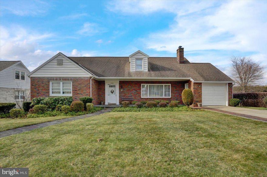 Welcome to 1926 Palm Street in the Hampden Heights community just above the Albright College Campus. This brick cape cod style home offers 2 bedrooms, 2 full and one half baths with 1262 square feet of no step main level living area plus a framed out mostly finished upper floor designed to add 2 more bedrooms, full bath number 3 and 1127 SF of addl living area . Covered front porch welcomes you and leads you into the spacious formal living room with open floor plan connecting it to the formal dining room just beyond. A full eat-in white kitchen with white appliance package remaining is just around the corner. Kitchen features include electric cooktop, pantry nook and plenty of cabinets and counter work area. 2 generous sized bedrooms separated by a full tub/shower tiled bath are tucked away on the left end of the main level. Bonus convenient half bath and sitting room/office completes the main level. Partially finished lower level family room features a wet bar ,knotty pine walls, and adds 635 square feet of finished living area. The other half of the basement offers a laundry area, full finished tiled stall shower bath and open space mechanicals area. All this plus central air, level rear yard, 1 car oversized garage, hardwood flooring believed to be under carpeted rooms (please verify), replacement windows, covered rear porch, beautifully landscaped beds and so much more make this the one to see! Schedule today!