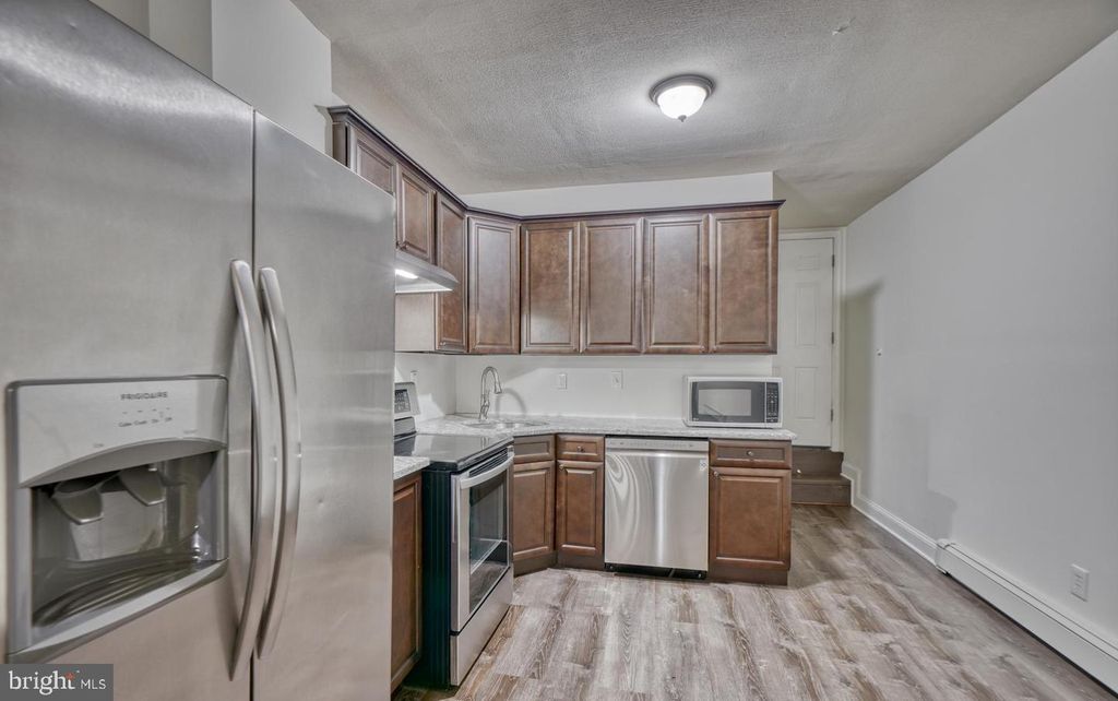 Photo of 204 N Port Street, BALTIMORE, MD 21224 (MLS # MDBA2188930)