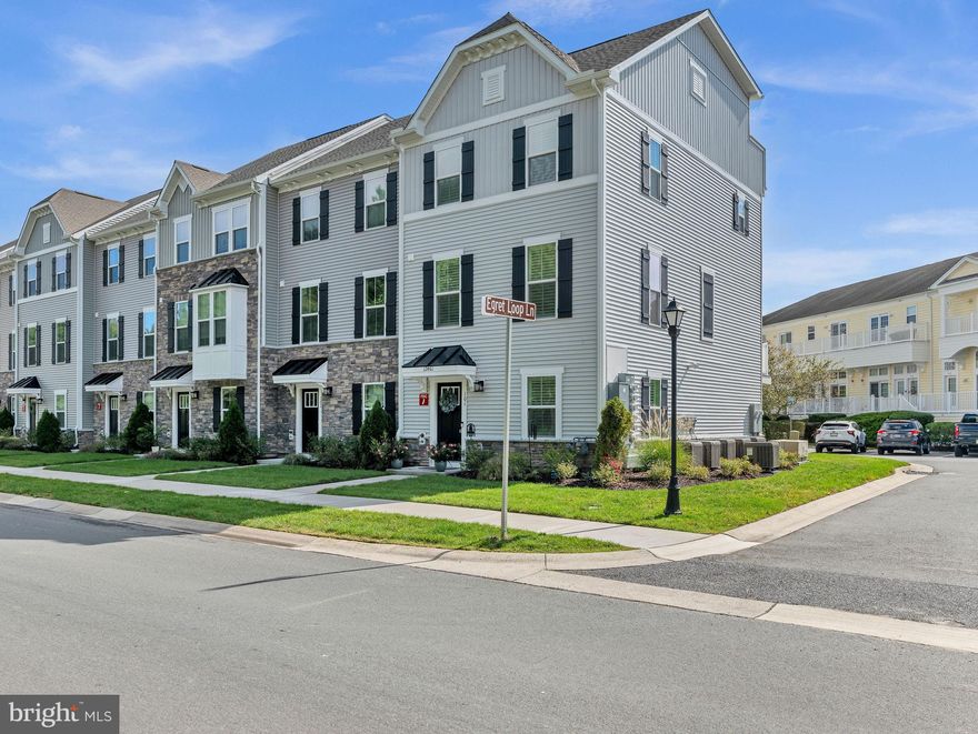 ***Owners will consider selling furnished for the right offer. All furnishings were purchased new last year. Some personal items not negotiable; seller & buyer to do a walkthrough inventory at time of contract.  
Amazing opportunity to own this rare,  end unit, Mozart model with a 4th floor! This model offers the space of single-family living, with the convenience of a townhome. The home is less than a year and a half old. The owners are relocating to Delaware. Their loss is your gain! Pass the attractive, landscaped front yard and tuck your car away in the rear entry, 2 car garage or convenient, overflow parking spots. Through the garage you will have interior access to the ground level with finished living space that can be used as an office, den, or television room. Also on the entry level you will find a coat closet, utility room and powder room. The main living area is one level up and comprised of a generous living room, kitchen and dining room with access to a sunny deck out back. Attractive and easy to care for LVP flooring flows throughout this level creating a soothing cohesion to the space. The kitchen has a natural gas stove, granite counters and stainless steel appliances + an abundance of bright, white cabinetry. The dining room can accommodate a farm-size table + additional furnishings for all of your favorite housewares or create a small sitting area. 
Have all your friends over .  .  .  they can comfortably relax and watch a movie or a Ravens (okay, Redskins!) game together in the living room. 
On the 3rd floor there is tasteful, neutral paint & carpet in the primary bedroom suite + 2 other bedrooms. The primary bedroom has a huge, walk-in closet and a large, en-suite bathroom with a double vanity and walk-in shower.  There is a full bathroom with a tub/shower combination serving  the other 2 bedrooms on this level. 
This is the only end unit, Mozart model in the entire community built with a 4th floor. This space gives you an additional (4th) bedroom & full bath with a walk-in shower that has a tiled seat for comfort and convenience. The additional bedroom and bathroom offers more options for family or guest sleeping arrangements and/or more income for rentals. Everyone will be vying for this space to take advantage of the deck with a distant glimpse of the sparkling Atlantic Ocean off of Assateague Island. The owners invested in Hunter Douglas plantation shutters and door treatments throughout, added ceiling fans in all bedrooms and the living room and painted the garage.
The Landings at Bayside is just minutes from downtown Ocean City (less than 5 miles to the Boardwalk), Downtown Berlin (just over 5 miles), and Assateague National Seashore (less than 5 miles) . There are multiple golf courses and restaurants nearby as well as a multitude of shopping options. 
This amenity rich community has a kayak launch, crabbing pier, tennis, pickleball and basketball courts, picnic areas, walking trails and a Club House with fitness center, indoor& outdoor pools.