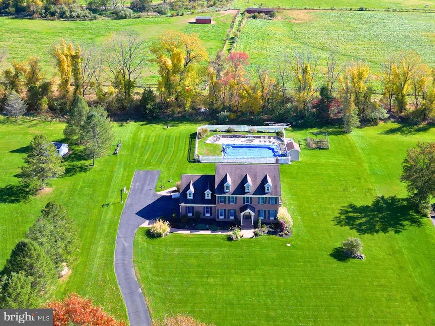 Nestled amidst 1.5 acres and within New Hope Solebury school district,  lies a gracious colonial with plenty of room to grow. This custom-built home has been well maintained and offers endless potential.  Boasting charming views of an in-ground pool and horse farm, the rear yard  space provides the perfect backdrop for outdoor enjoyment. The interiors are a canvas of adaptable space featuring freshly painted kitchen/living rooms as well as hardwood flooring throughout.  A cozy, wood-burning fireplace in the family room allows for total relaxation & the entire house is spray foam insulated, making it extremely energy efficient.  Upstairs there are four bedrooms, including a sprawling primary suite featuring walk-in closets and a primary bath overlooking the rear yard pool. Bring your vision to finish the generous basement which currently provides incredible storage space and has been roughed for a full bathroom.  Exuding curb appeal with its classic brick facade and landscaping, this stately home awaits your personal touches! It provides easy access to distinctive shopping, entertainment, parks, and restaurants, and offers 2 car garage parking with ample driveway space.  Experience for yourself the timelessness and exclusivity this property has to offer. Middleton Lane rarely experiences turnover; its spacious lots, serene location and family-friendly disposition provide comfort, and a high-quality-of-life for the those who proudly reside here. *Interior photos coming soon*