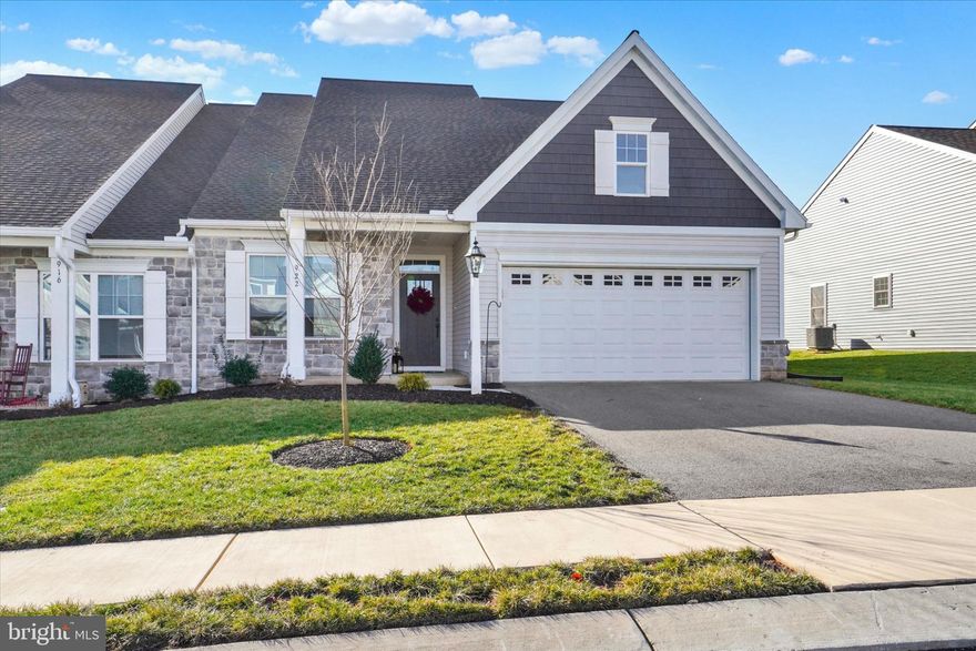 This nearly new home proves that downsizing doesn’t mean sacrificing lifestyle. Welcome to 922 Shadowbrooke Drive, a beautifully maintained, one-level ranch-style duplex nestled in the highly desirable Sagebrook 55+ community. Built in 2023, this home offers 1,692 square feet of thoughtfully designed living space with 2 bedrooms and 2 full baths, perfectly suited for comfortable, low-maintenance living. The open-concept layout is bright and inviting, with a spacious living area that flows effortlessly into the kitchen and dining space—ideal for both everyday living and entertaining. The kitchen is tastefully appointed with stainless steel appliances, a gas stove, ample cabinetry, a center island, and pantry storage, combining function with modern style. The primary suite serves as a private retreat, featuring a walk-in closet and an en-suite bath. A second bedroom and full bathroom provide flexibility for guests, hobbies, or a home office. Additional highlights include custom cellular blinds, main-level laundry, a convenient mudroom area, and an attached garage, making day-to-day living effortless. Enjoy a truly carefree lifestyle with an HOA that handles lawn care, snow removal, and common area maintenance, giving you more time to relax and enjoy what matters most. Located near shopping, dining, medical facilities, and major commuter routes, Sagebrook offers peaceful living with easy access to everything Dover and York have to offer. Move in ready, this home blends modern finishes, smart design, and low-maintenance convenience—an exceptional opportunity in one of Dover’s most sought-after 55+ communities.