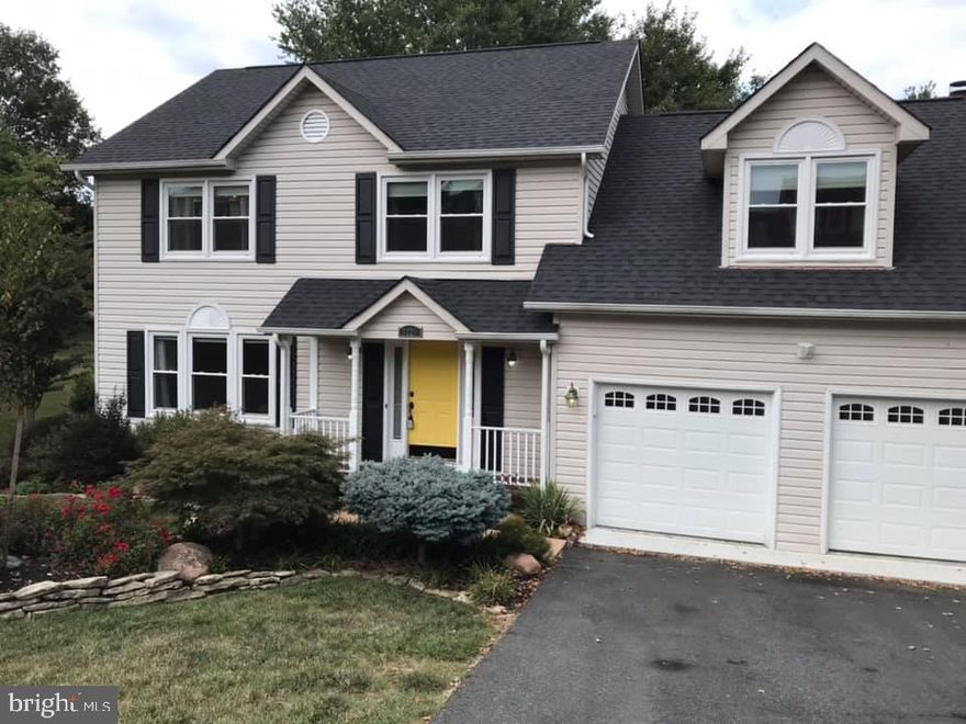 Welcome home to Lord Barton Drive!   Seller shows pride of ownership in this magnificent 4 bedroom, 2.5 bath colonial home with upgrades galore.   Inside you'll find a gourmet kitchen fit for any Chef's Dream,  with granite countertops, gorgeous tile backsplash, a center island and stainless steel appliances.   Get cozy by the stone fireplace in the spacious living room.   Upstairs you will find 4 spacious bedrooms, including a master suite with a magnificent spa-like master bathroom with beautiful tile work.   In the fully finished  basement you can kick back and relax while watching your favorite movie in the theater room or get fit in the fitness room with full wall mirror.  You'll have lots of space in your attached 2 car garage.  Enjoy entertaining on your large deck overlooking your backyard or just enjoy the view of your beautifully landscaped yard from the front porch.  Close to VRE, shopping, and restaurants!  Location! Location! Location!   This home is a must see.  It will not last long!  Pictures coming soon.