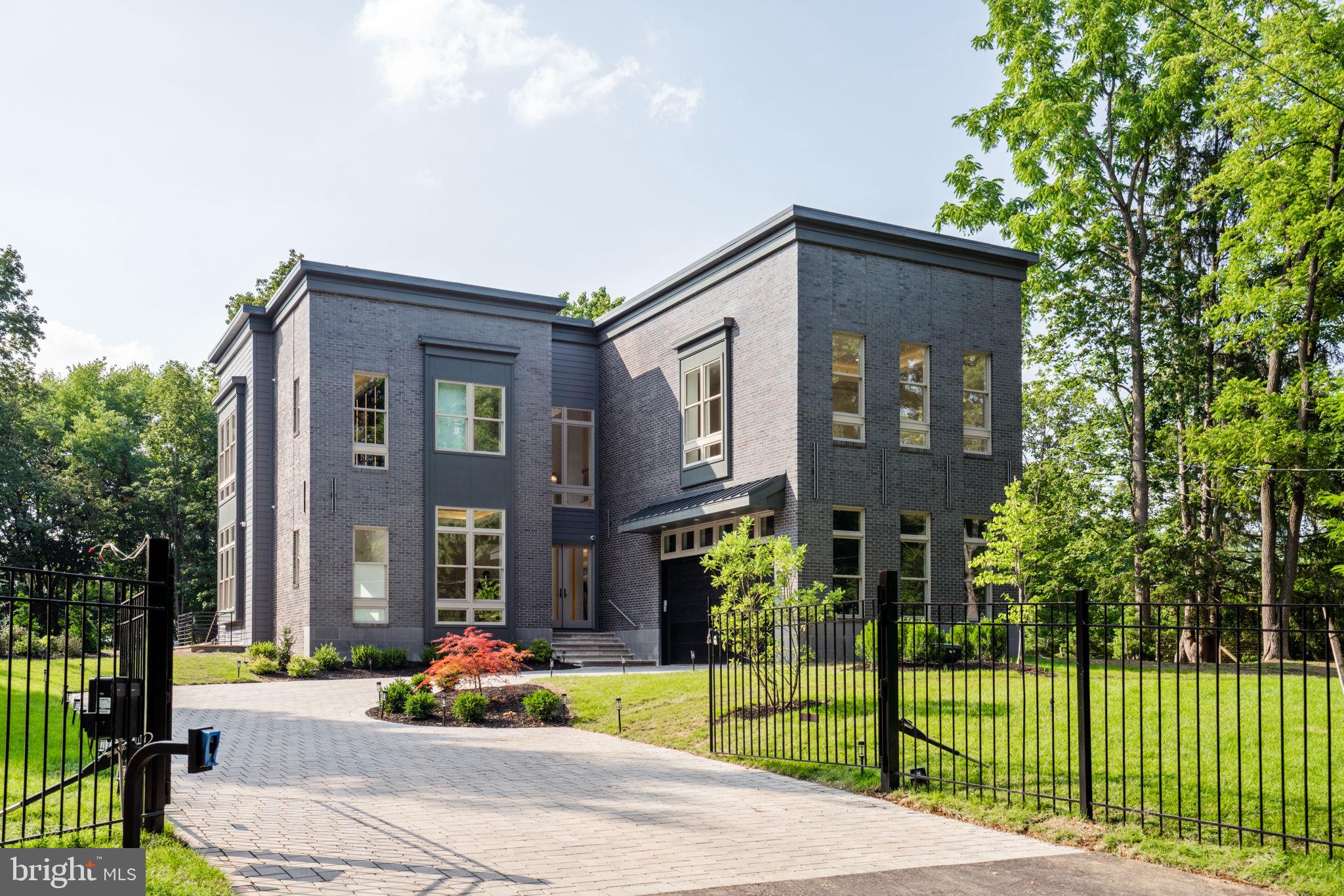 Welcome to 221 Northwestern Ave, this spectacular new construction home on 1.31 acres with a gated entry will have you wanting to be in two places at once- the well-appointed interior and the incredible dream-like park setting. The setting feels bucolic, is steps from the best of Wissahickon Valley Park in the heart of Northwest Philadelphia. With 8000+ square feet of living space this home boasts 6 bedrooms, 7.5 bathrooms and a 2-car garage. The main floor is flooded with natural sunlight and features a gourmet kitchen, dining area, family room and a breathtaking living room with 22+ ceilings, oversized windows and a fireplace. This floor is complete with an en-suite, mudroom and a powder room. The 2nd floor features 4 en-suites all with large windows and walk-in closets with breathtaking tree top views. There is an ideally situated laundry room with a sink, extra cabinetry and stone counters. The true master suite features a sitting area, a large walk-in closet and a spa-like bathroom with a double sink vanity, water closet, soaking tub and and walk-in shower with rain shower, handheld faucet and body spray. The lower level features another en-suite and offers plenty of opportunities as a gym, play area and/or a home theatre. This house features multiple outdoor spaces where you will enjoy the park-like setting. This house is minutes from the restaurants and shopping in Chestnut Hill, Manayunk, Plymouth Meeting and Conshohocken. Easy commute to Center City, King Of Prussia and 76. There are so many features and highlights that it is too much to note! Expected completion date mid May, 2023. *The property has a Phila zip code for postal purposes but is located in Springfield Township and Springfield School District.*