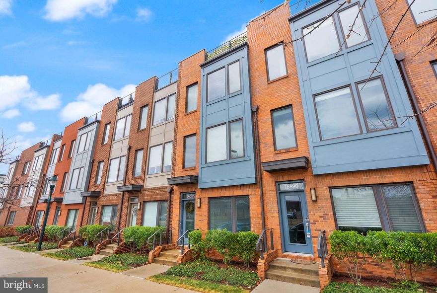 THIS is the one you've been waiting for at WestSide at Shady Grove Metro! This amazing 4 level TRUE townhome (not a 2/2!)  is filled to the brim with custom decorator touches and ready for new owners. Ground level entry with attached garage is welcoming and convenient. The main level features a bright and open floor plan with tons of natural lights from the floor to ceiling windows and rear deck off the kitchen. Excellent flow with sleek and modern selections throughout the kitchen - white quartz countertops, stainless appliances and plenty of pantry storage! A hallway half bath is convenient but tucked out of the way.

One level up you will find two generously sized bedrooms, both with en suite bathrooms and the primary with an oversized walk-in closet. Lots of natural light here too as the primary faces the rear of the home and has a wall of windows. The upper-most level has its own bedroom and en suite bath PLUS a bonus loft or office space that walks out to a huge rooftop deck. Tons of privacy though as the side walls provide a sheltered oasis of outdoor living.

LEED Certified build means this unit is incredibly energy efficient and utility bills are super reasonable. Cannot beat the location - only a few minutes to Shady Grove Metro, Starbucks, CVS and more! Plenty of street parking in the neighborhood and on Crabbs Branch for guests. Pet-friendly neighborhood is perfect for your furry family members as well!